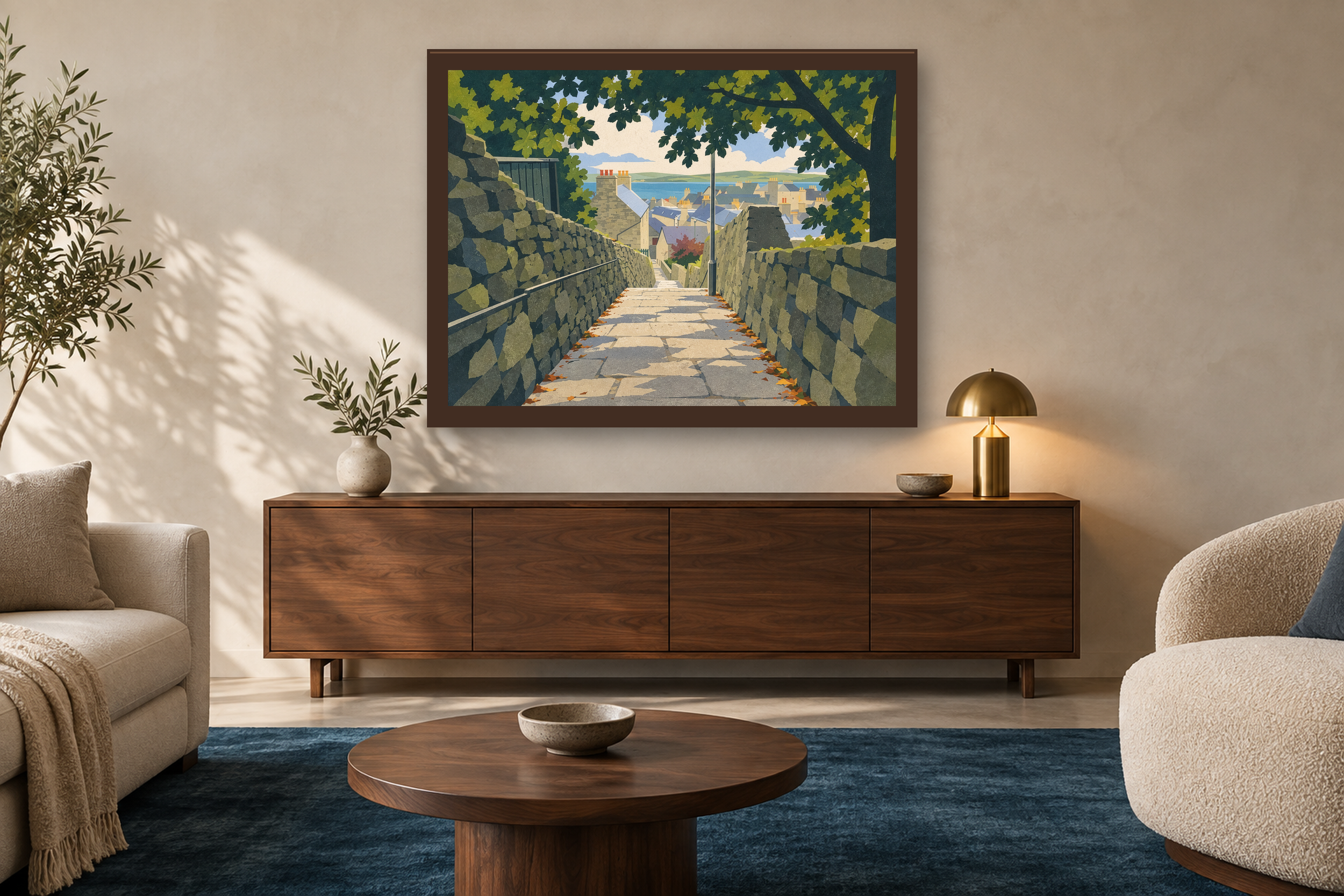 The Way Down in the lithographic style, framed above a walnut credenza in a sunlit neutral living room.