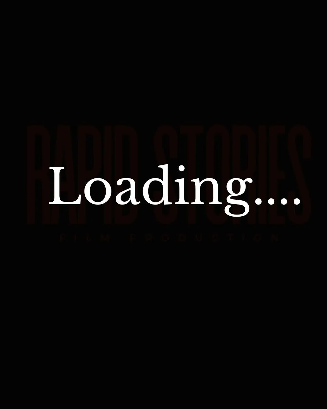 Black screen with red text reading 'Loading...' and faint text 'RED DEAD'S' in the background.