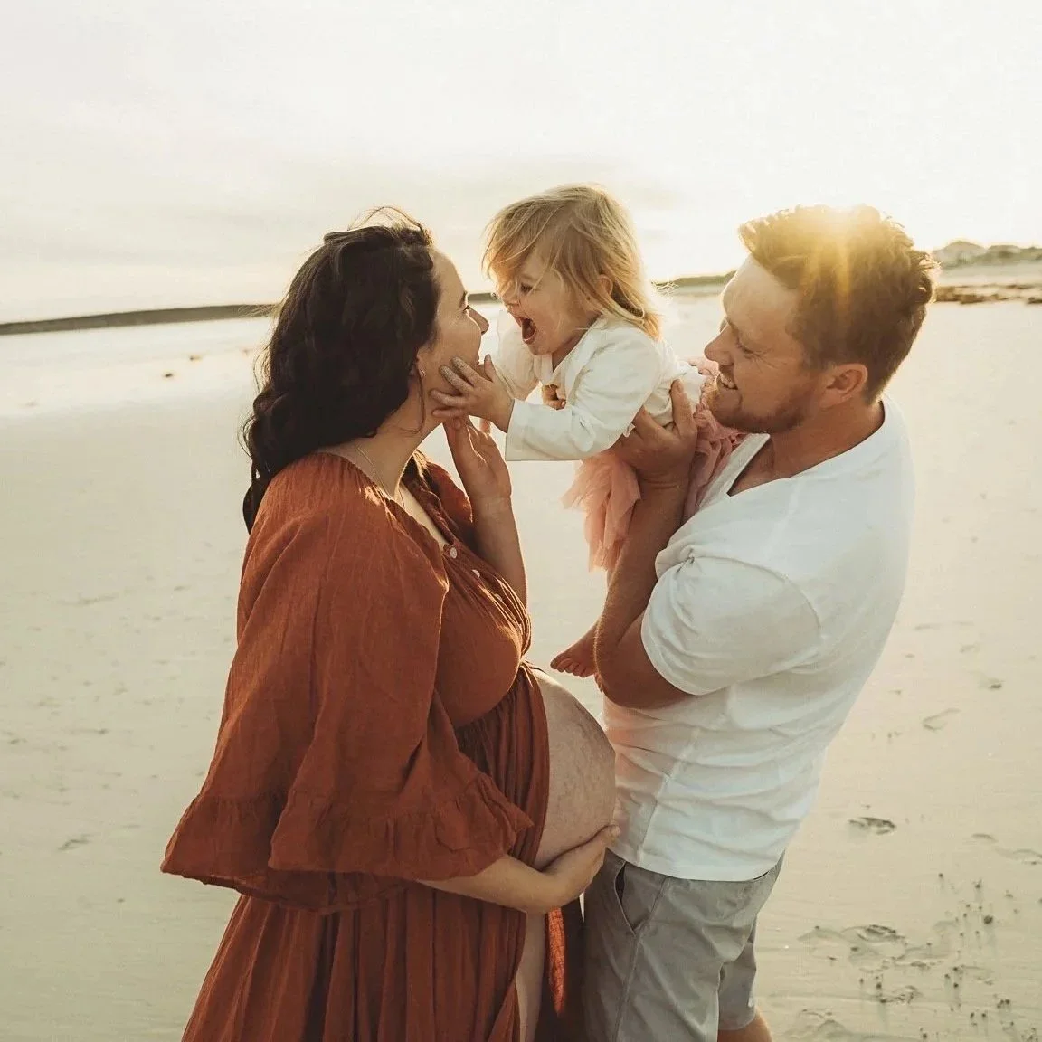 mum dad and toddler at maternity photoshoot on Ceduna beach