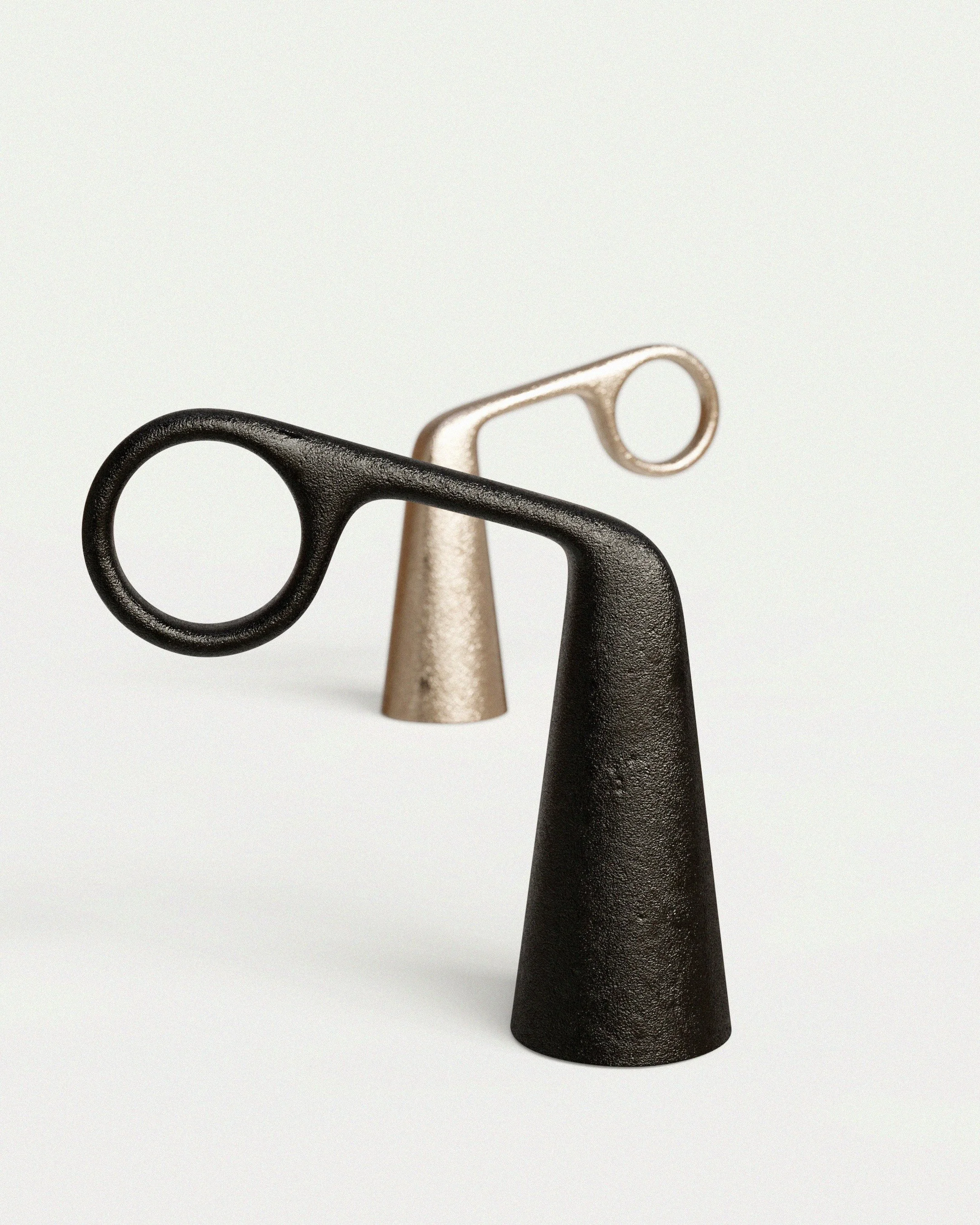 Snuffy is a cast metal candle snuffer by new zealand designer Andrew Roberts