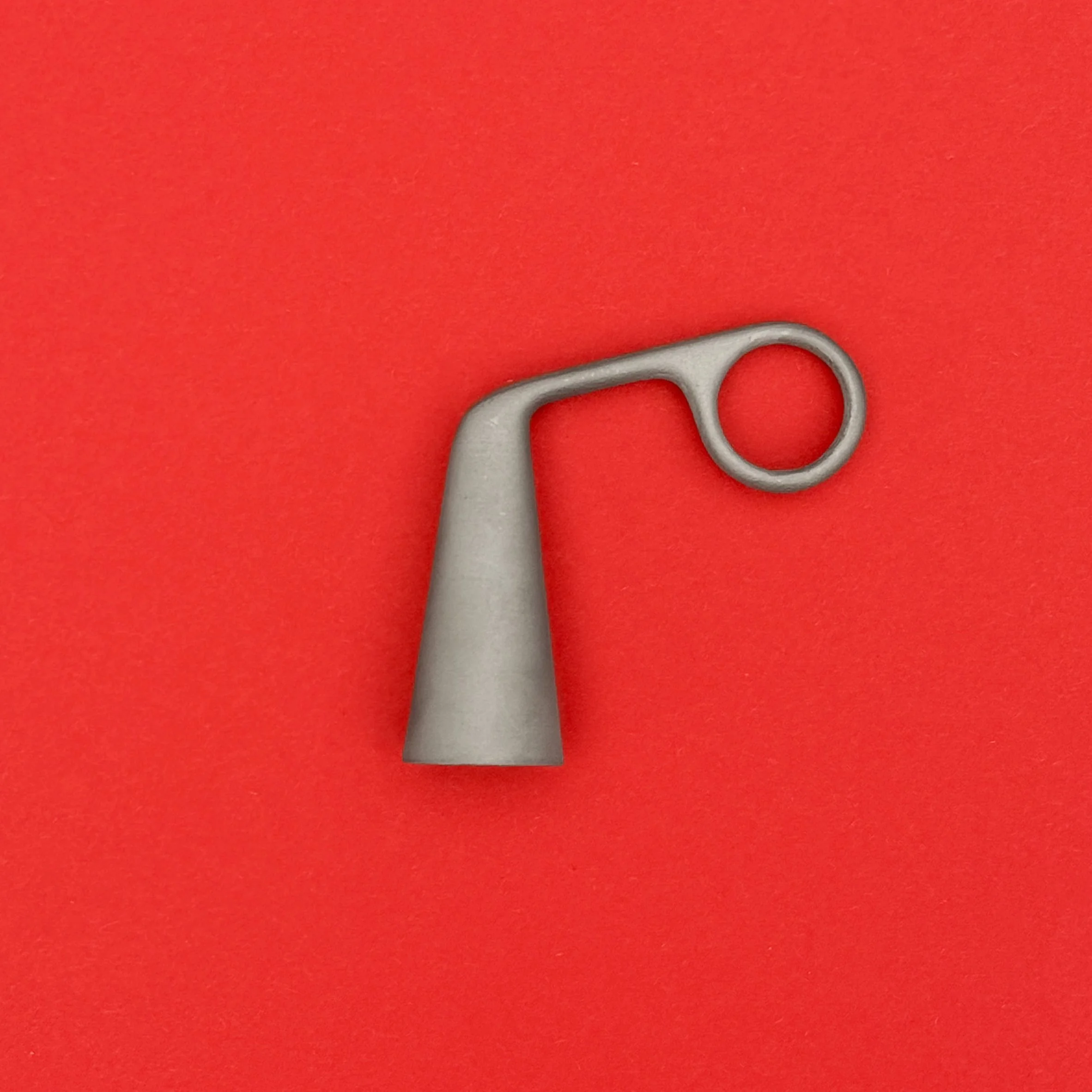 Snuffy is a cast metal candle snuffer by new zealand designer Andrew Roberts