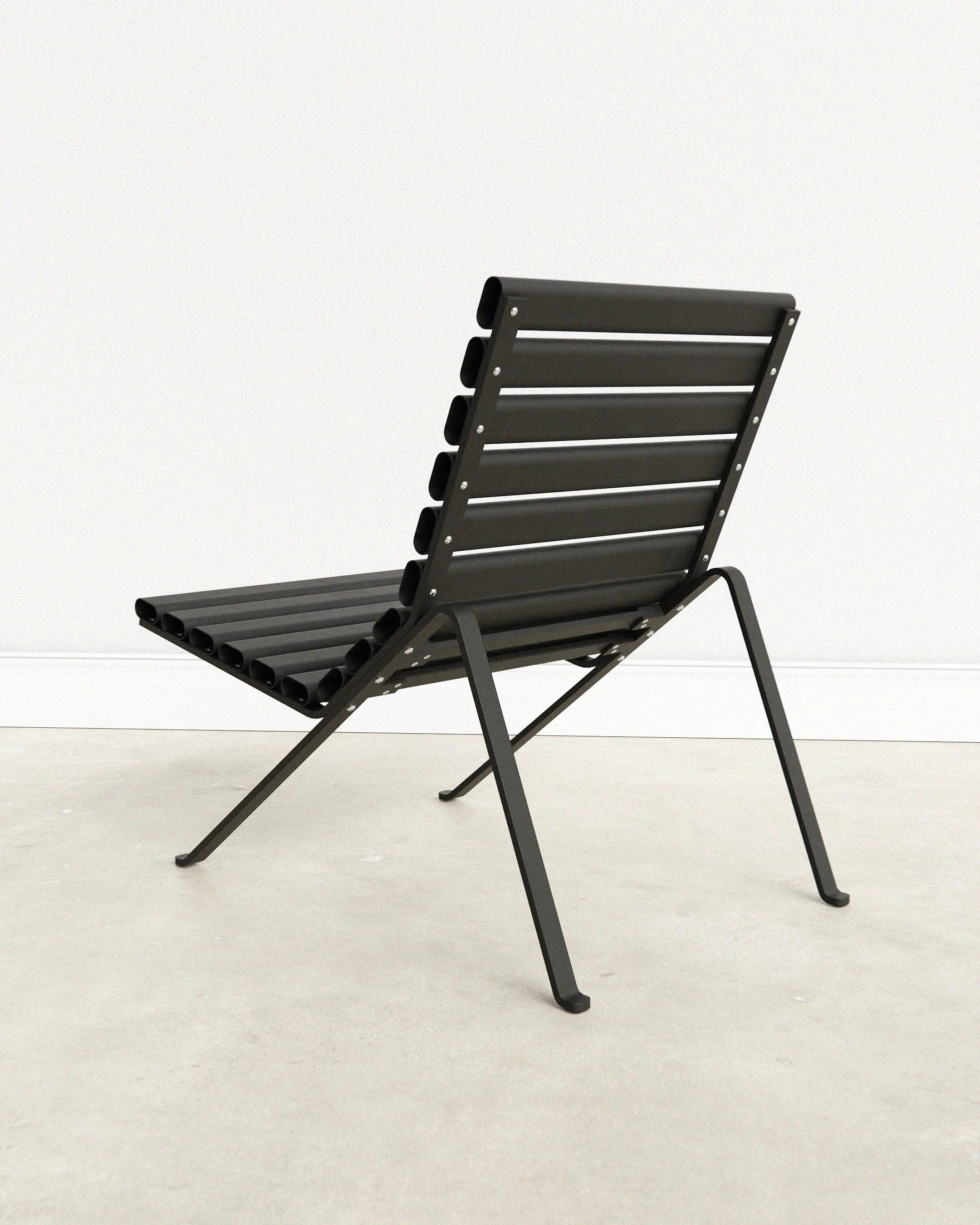 The HMG Chair by Andrew Roberts is an outdoor lounge chair defined by its clarity of structure and material restraint. Using 'off the shelf' components, the chair reduces fabrication to a minimum while remaining distinctive.