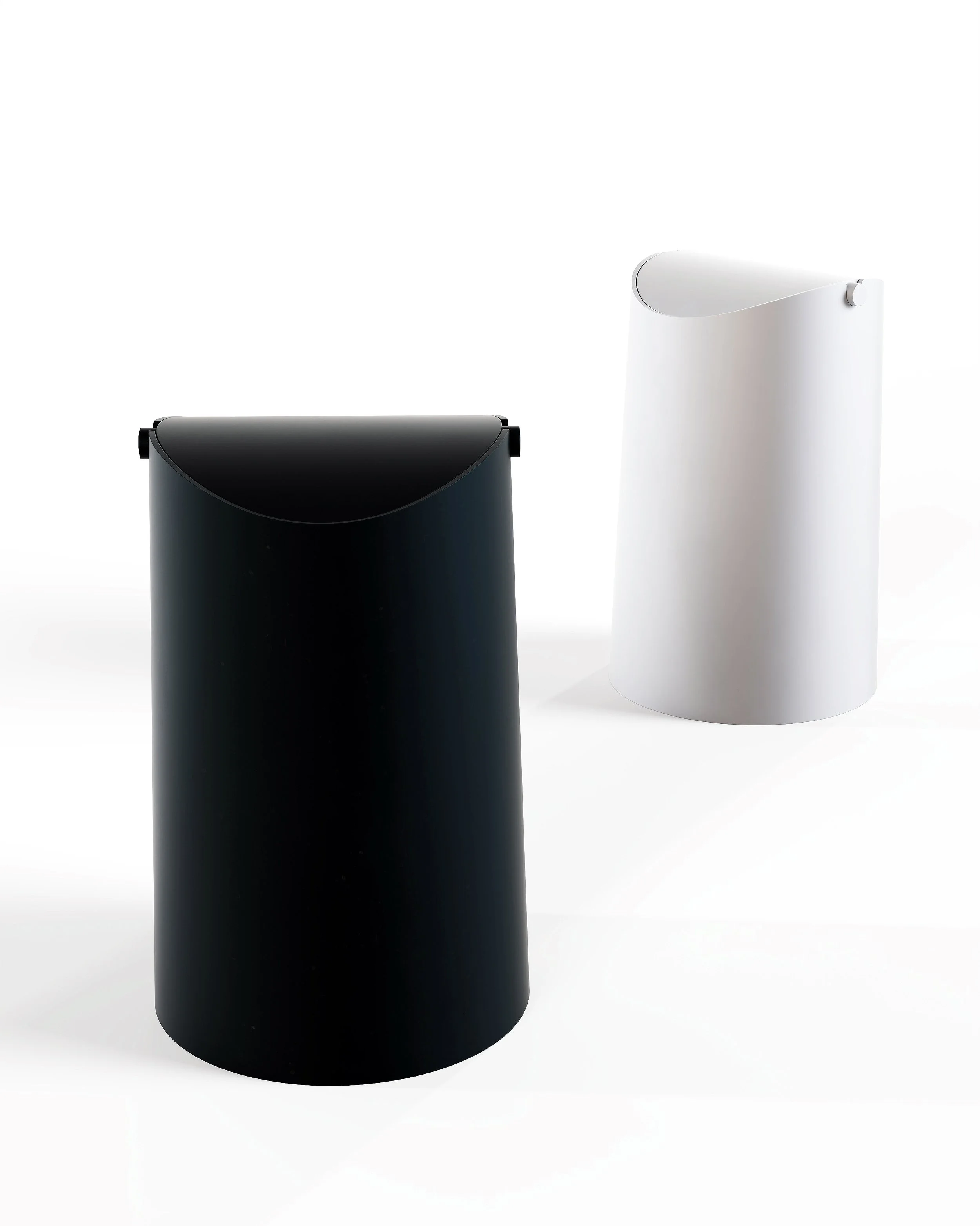 Flippy waste bin designed by Andrew Roberts, featuring a cone-shaped rolled steel body with fitted pivoting lid and minimal welded construction for modern interior use.