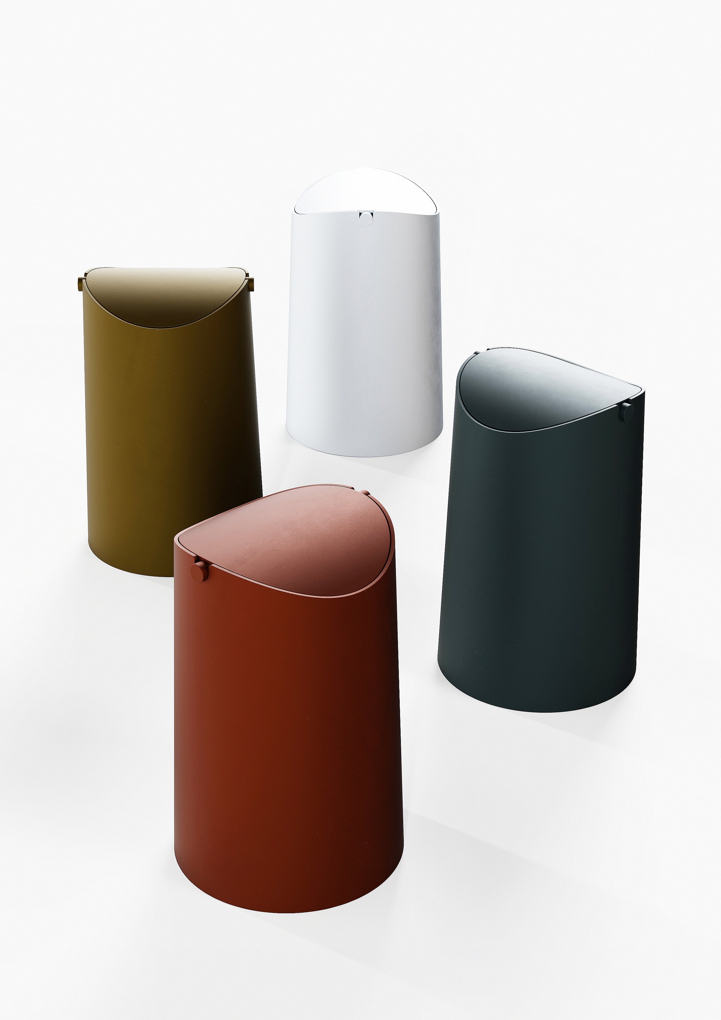 Flippy waste bin designed by Andrew Roberts, featuring a cone-shaped rolled steel body with fitted pivoting lid and minimal welded construction for modern interior use.