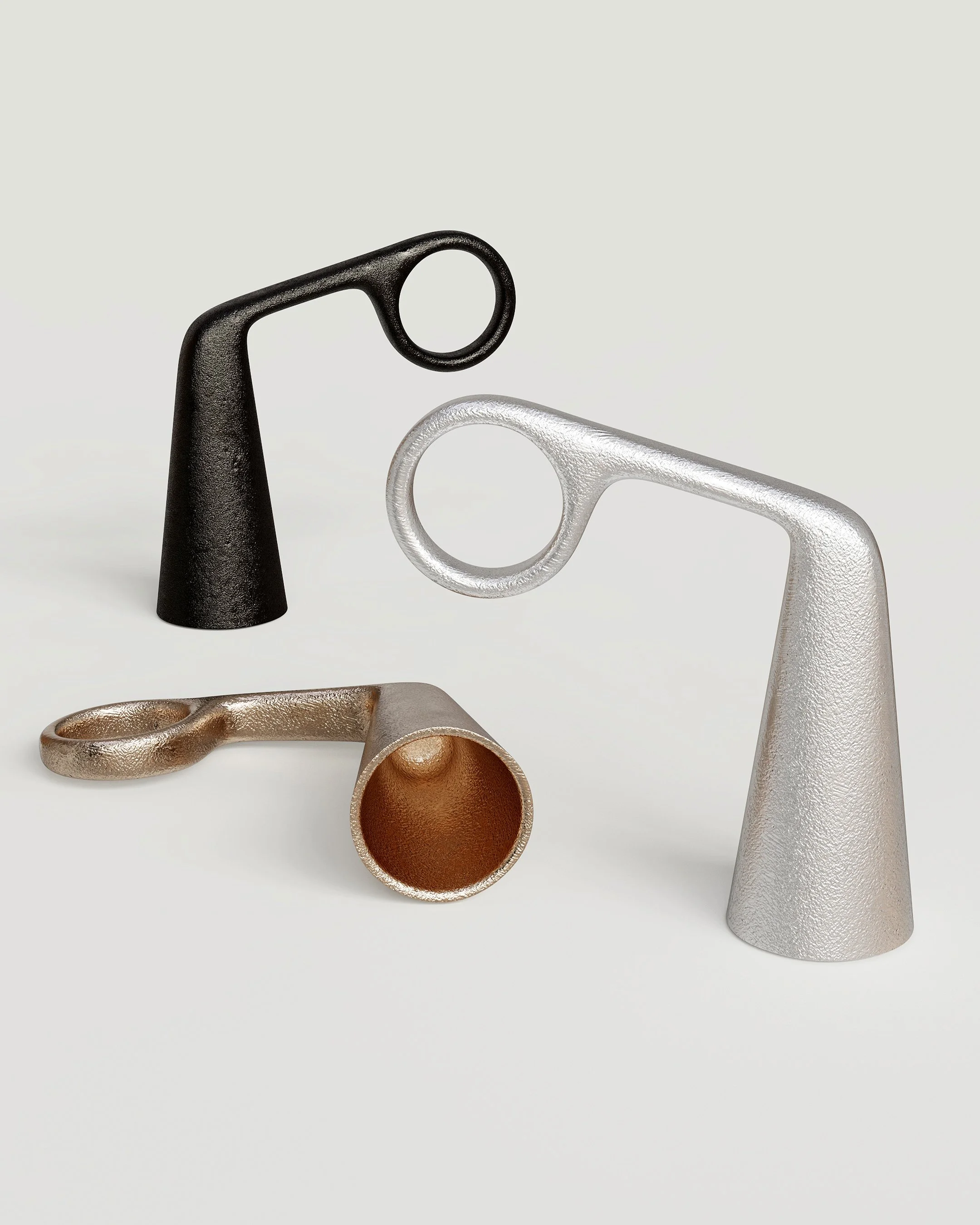 Snuffy is a cast metal candle snuffer by new zealand designer Andrew Roberts
