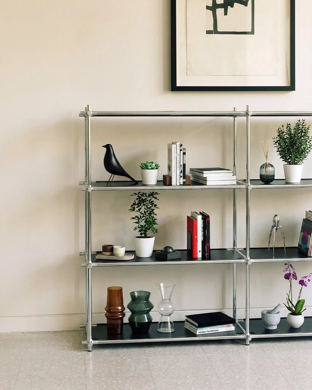 Knuckle Bones by Andrew Roberts modular shelving system featuring cast joint connectors, laser-cut steel tubing, and press-fit components arranged in a configurable structural storage layout.