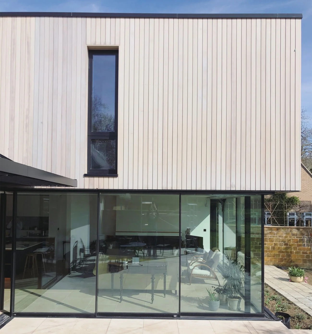 Modern Garden House Northampton Northamptonshire Vertical Timber Cladding Slimline Glass Glazing Window
