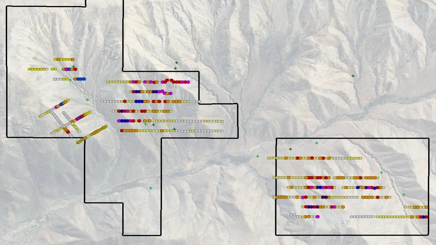 A satellite map of a mountainous area with overlaid colored lines and dots depicting data points or routes, organized within black outlined regions.