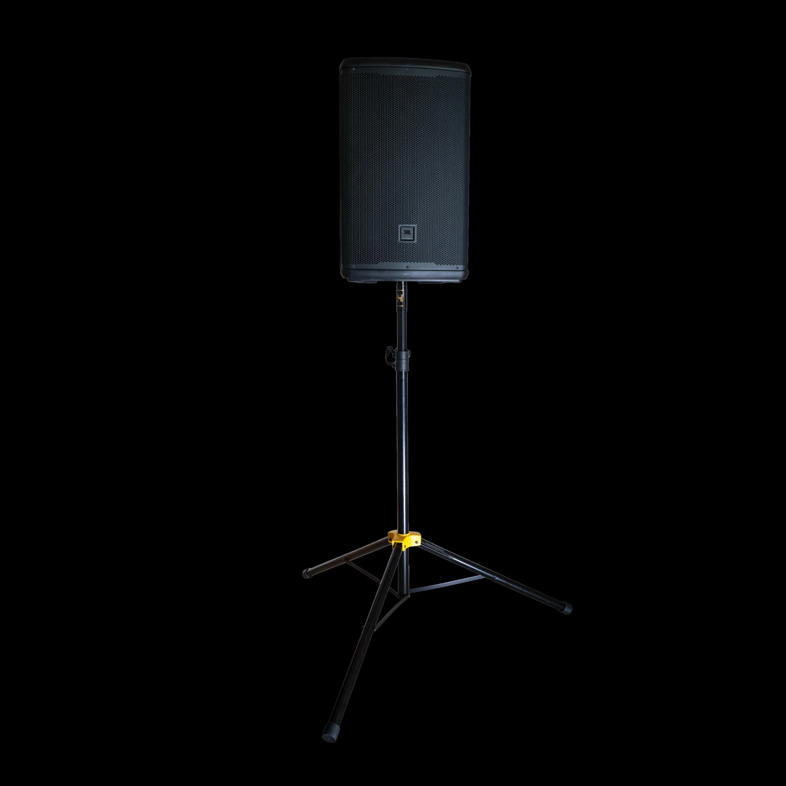JBL EON715 professional speaker mounted on a stand