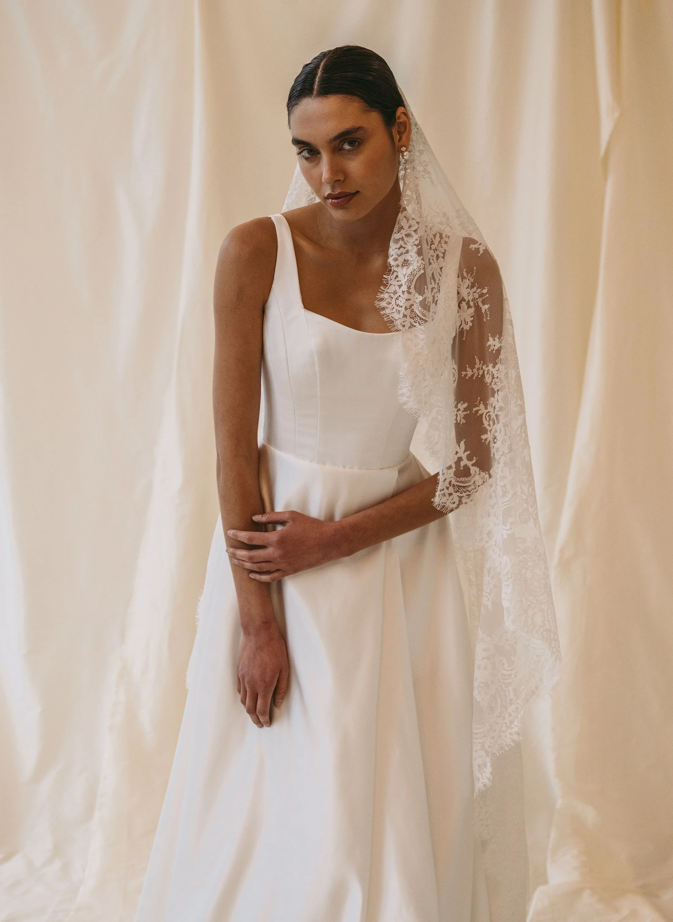 satin-bridal-dress-with-lace-border-veil.jpg