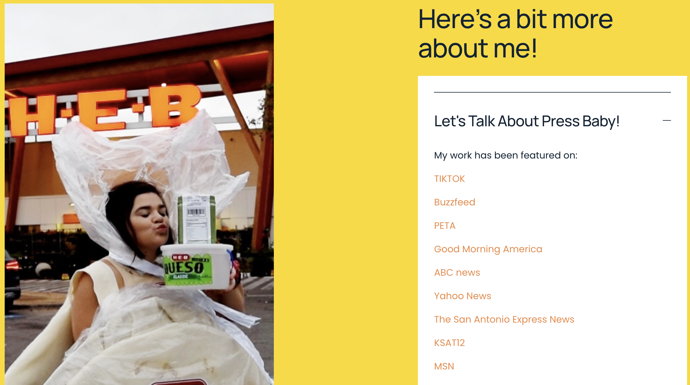 A woman dressed in an elaborate white costume with plastic accents, holding a tub of queso cheese, standing outside a store with a lit orange sign displaying the letters 'HEB' in the background.