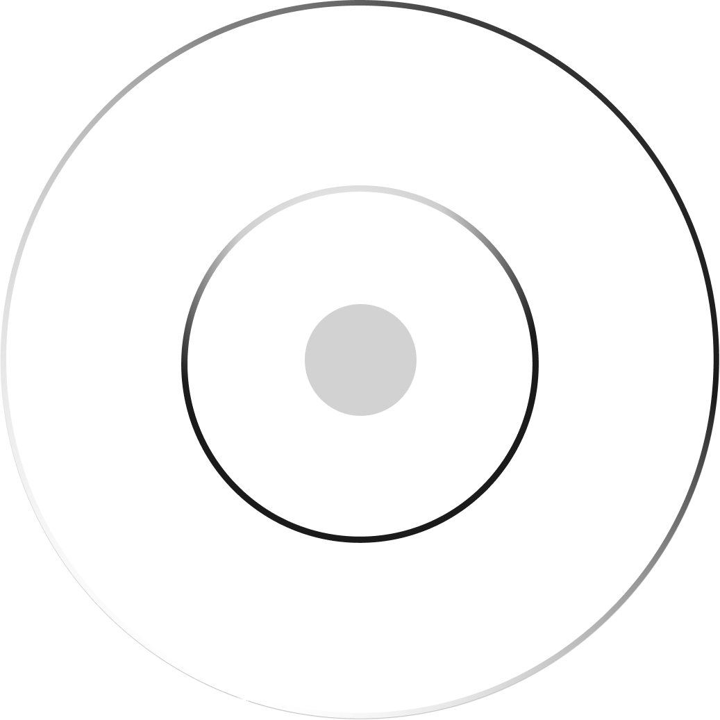 Close-up of a push button switch with a white circular button and a black casing.