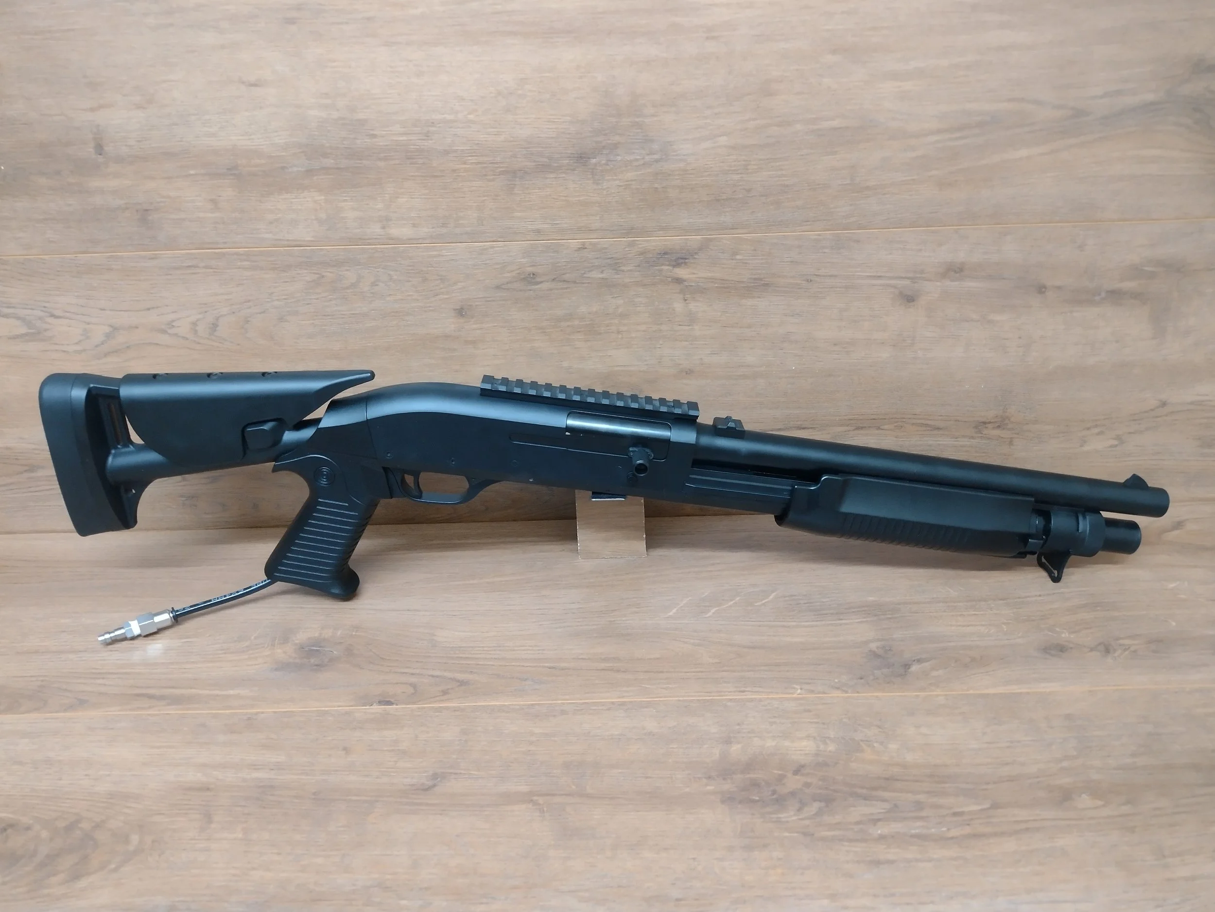 Benelli M3 short with collapsing stock and rail HPA semi-auto tri-shot airsoft shotgun