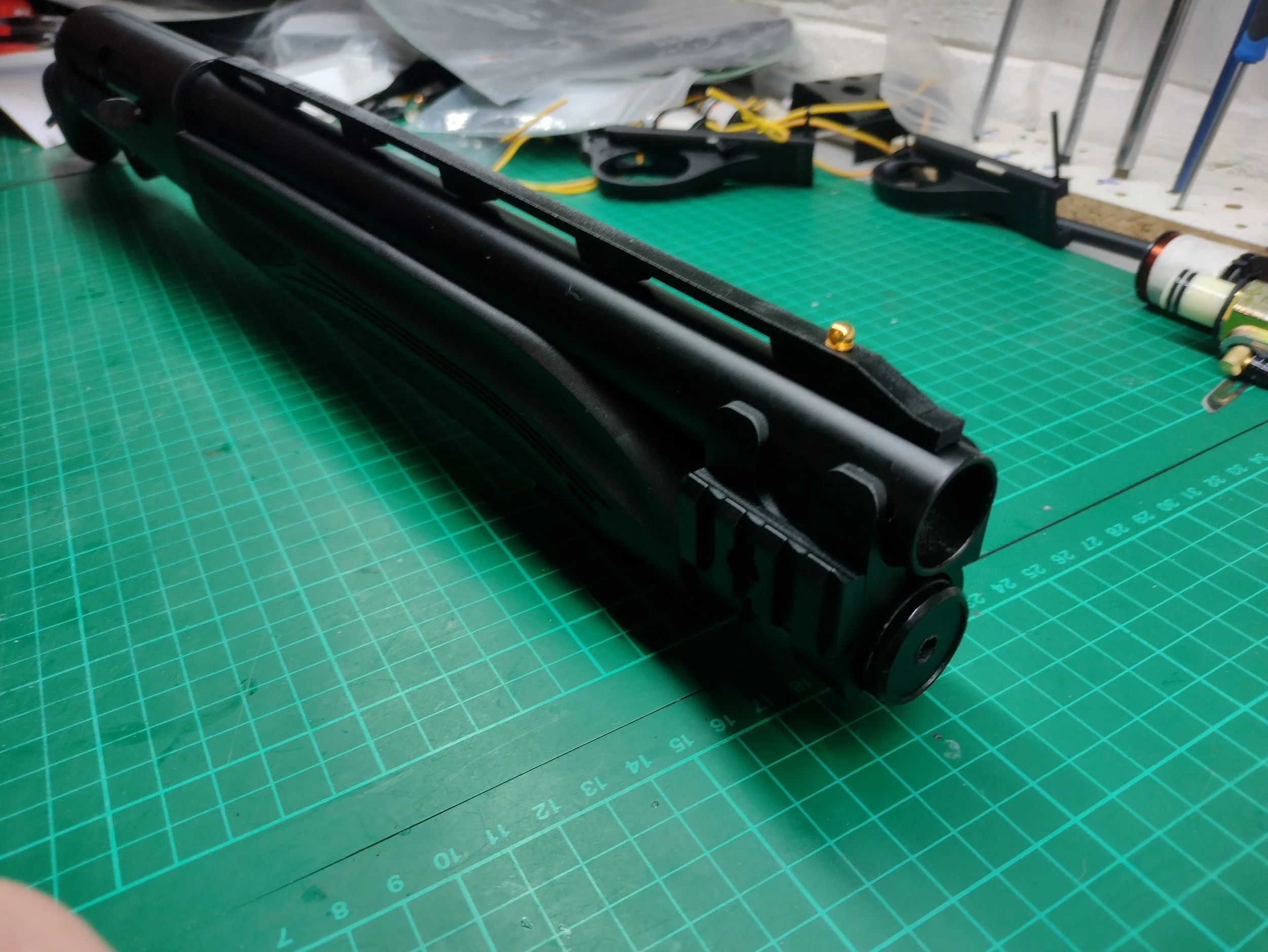 Fearsome looking business end of the Remington V3 TAC-13 HPA semi-auto tri-shot shotgun with rib