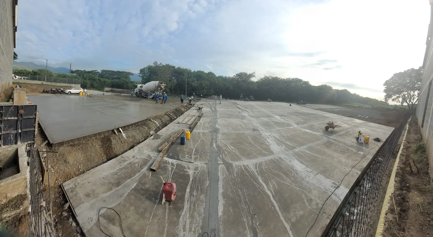 Oranssi technician working on a roof project