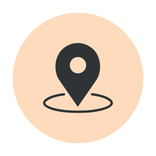 Map marker icon inside a beige circle with a black background.