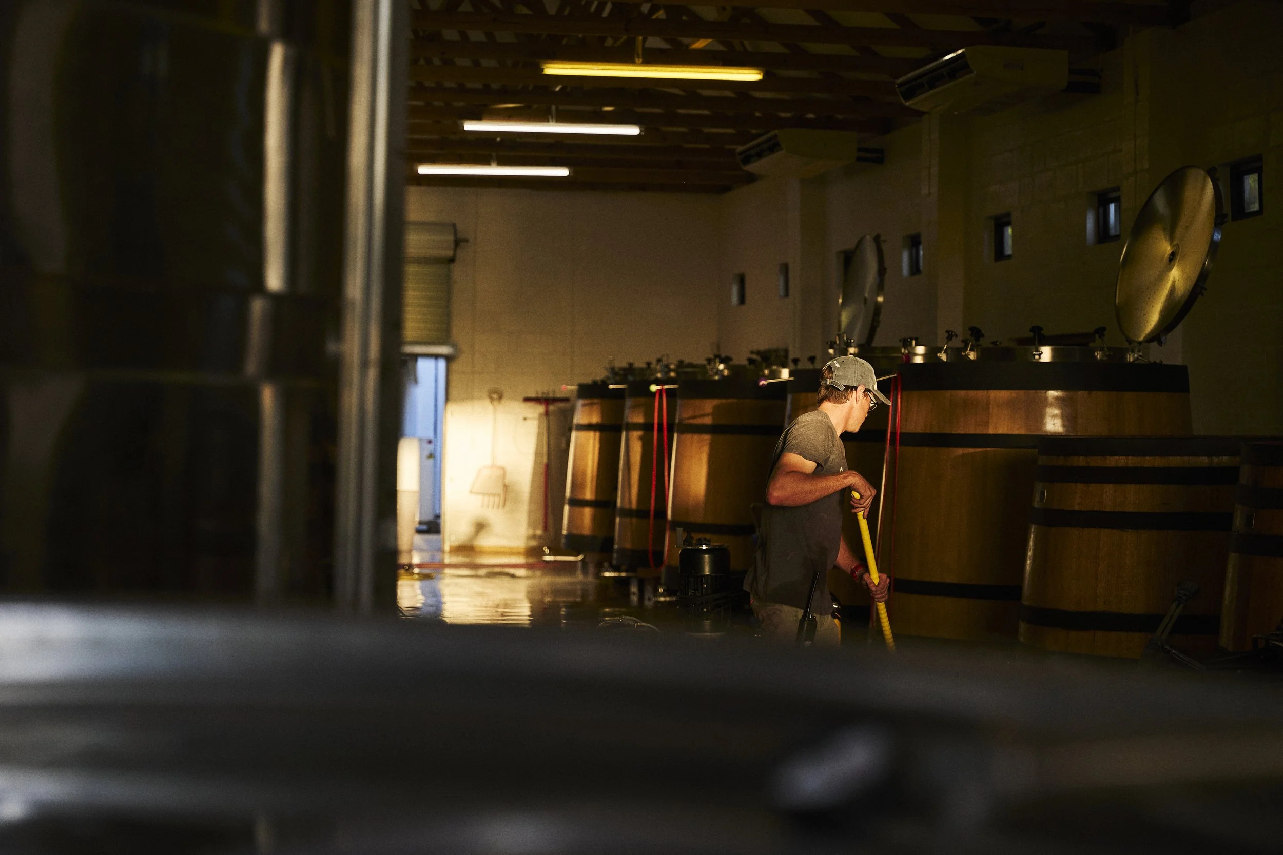 Restless River Vineyards. Winery, cellar, oak vats, open fermentors, punch down, Hemel-en-Aarde, fermentation, traditional.