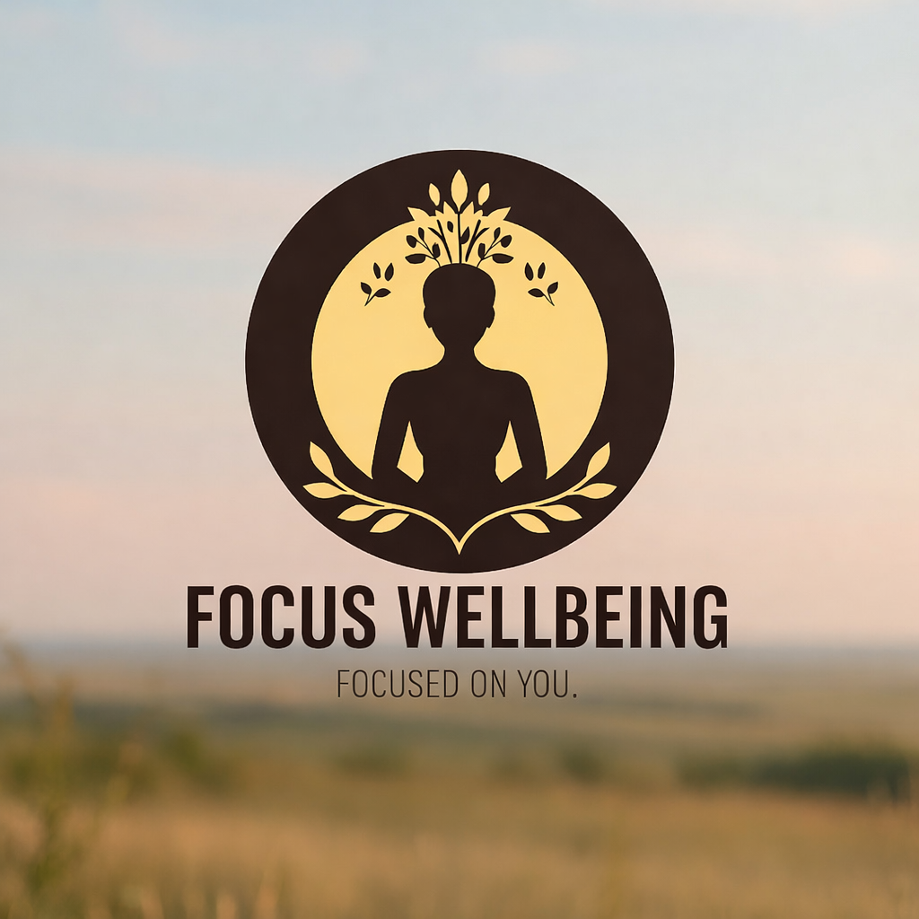 Logo with a silhouette of a person meditating, surrounded by leaves and branches, with the text "Focus Wellbeing" and the tagline "Focused on You."