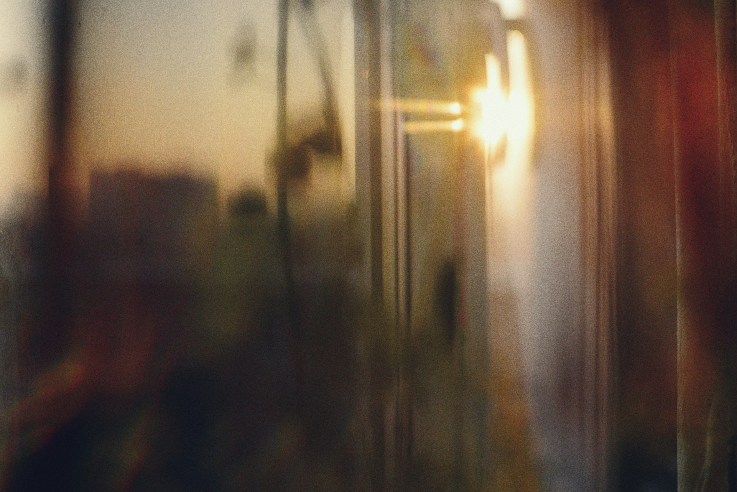 Abstract image of sunlight reflecting on glass representing wellness and peaceful general reflexology treatment for stress relief in Belfast for men and women