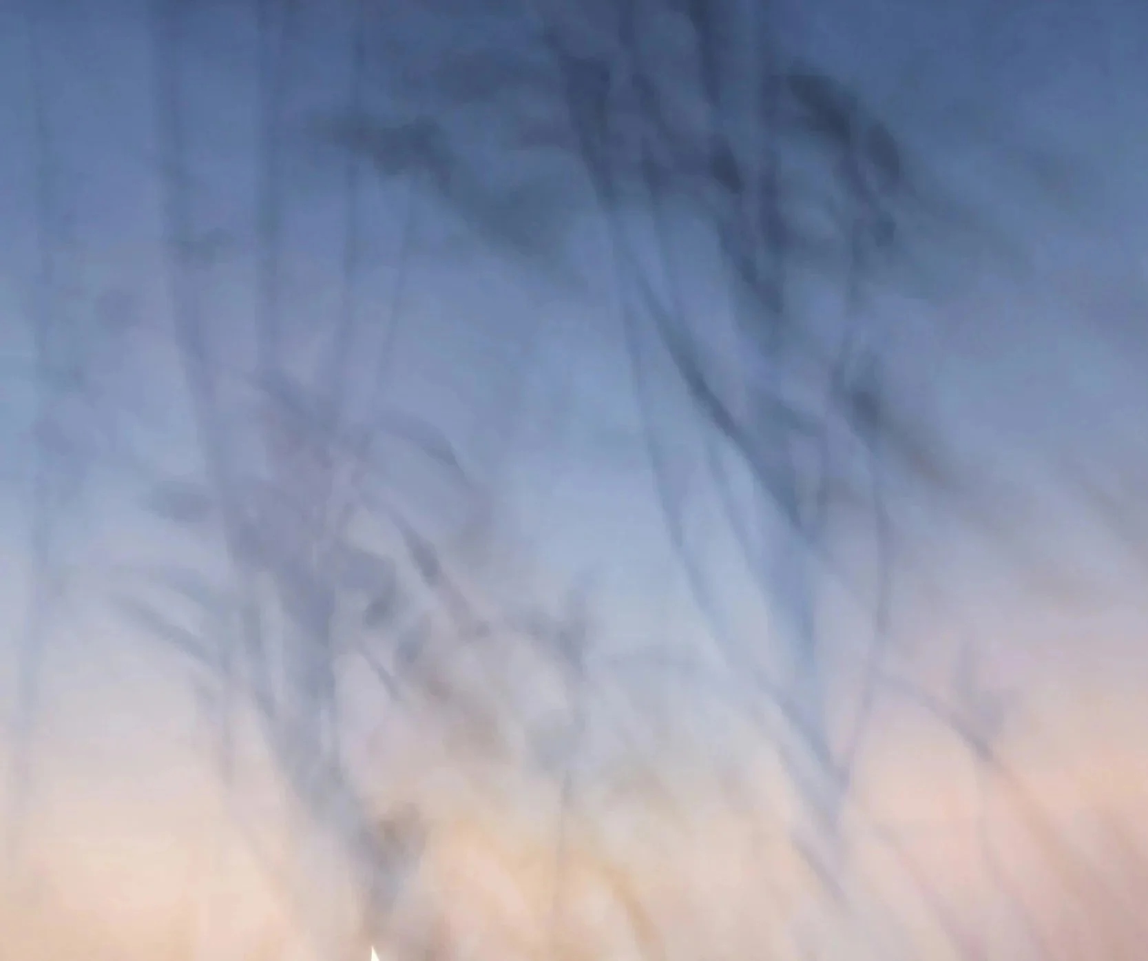Abstract image of dusk sky with pink and blue representing calm and restorative perimenopause and menopause support reflexology treatment in Belfast