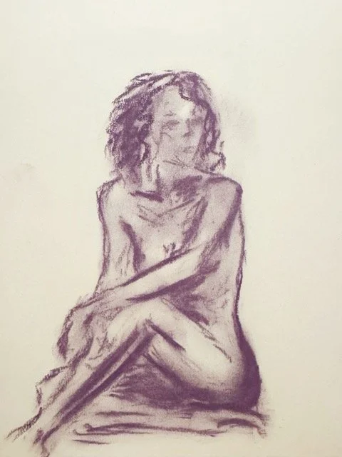 A monochrome sketch of a nude woman sitting with her arms crossed over her knees, with curly hair, on a plain background.