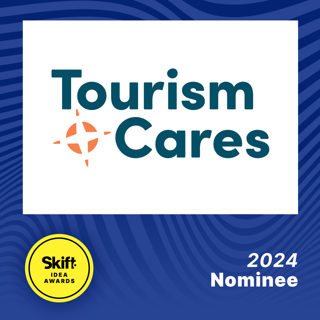 Tourism Cares logo with a compass symbol, Skift Idea Awards 2024 Nominee badge in yellow, and a blue striped background.