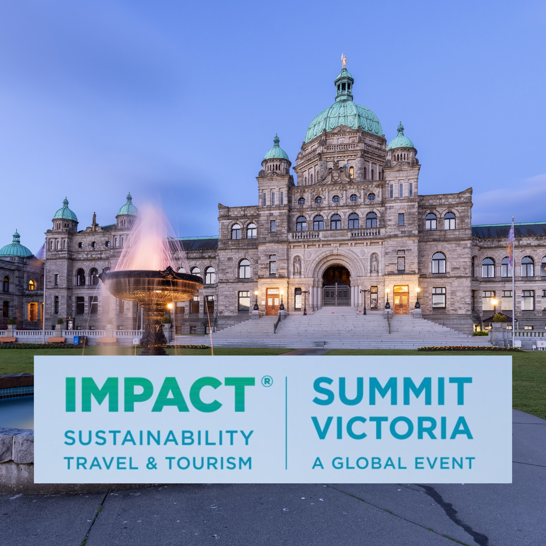 Victoria Capitol building in Victoria, British Columbia, Canada, with a fountain in the foreground and event banner.