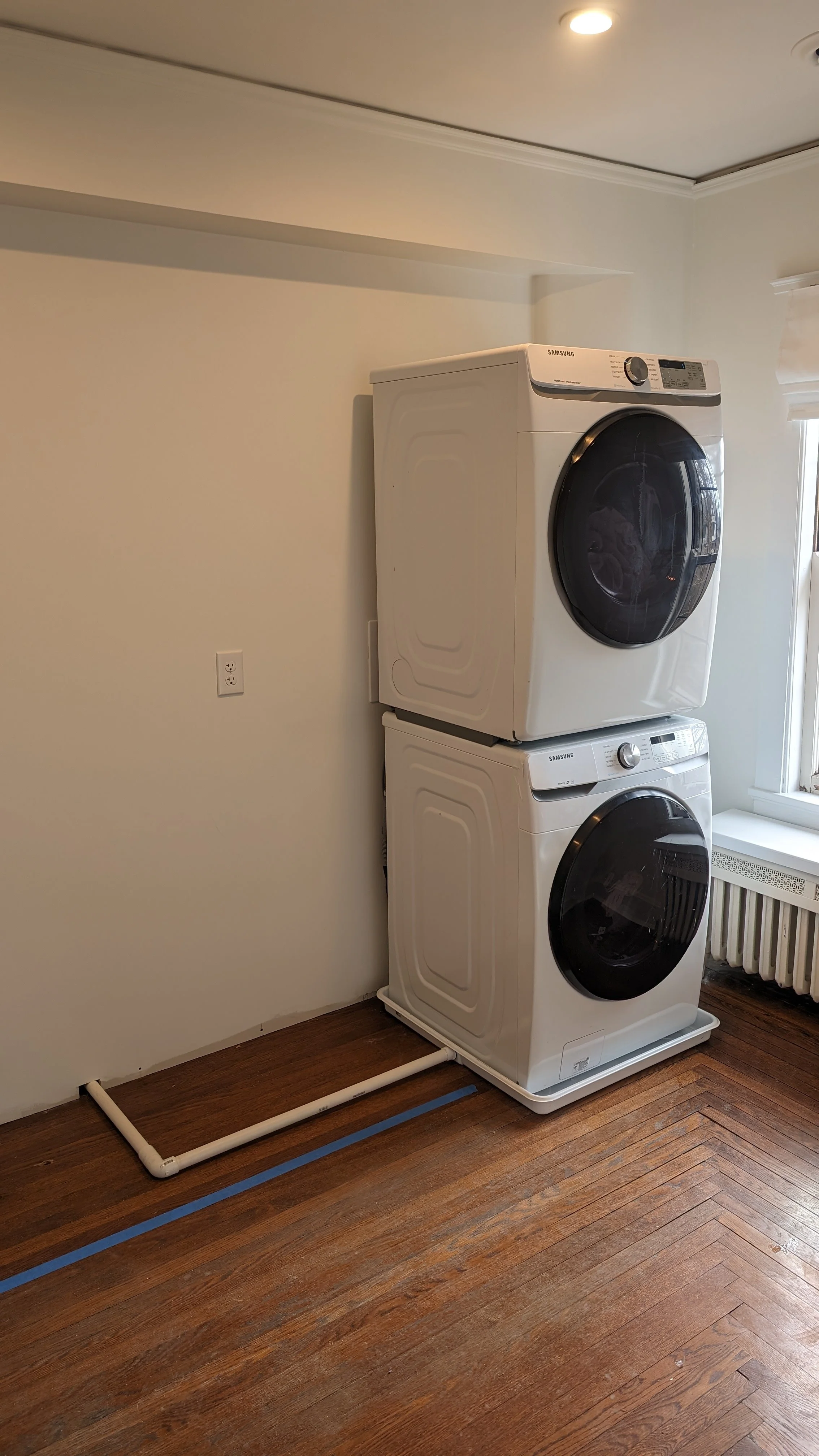 Norwood-OH-Laundry-room-renovation-stacked-washer-dryer.jpg