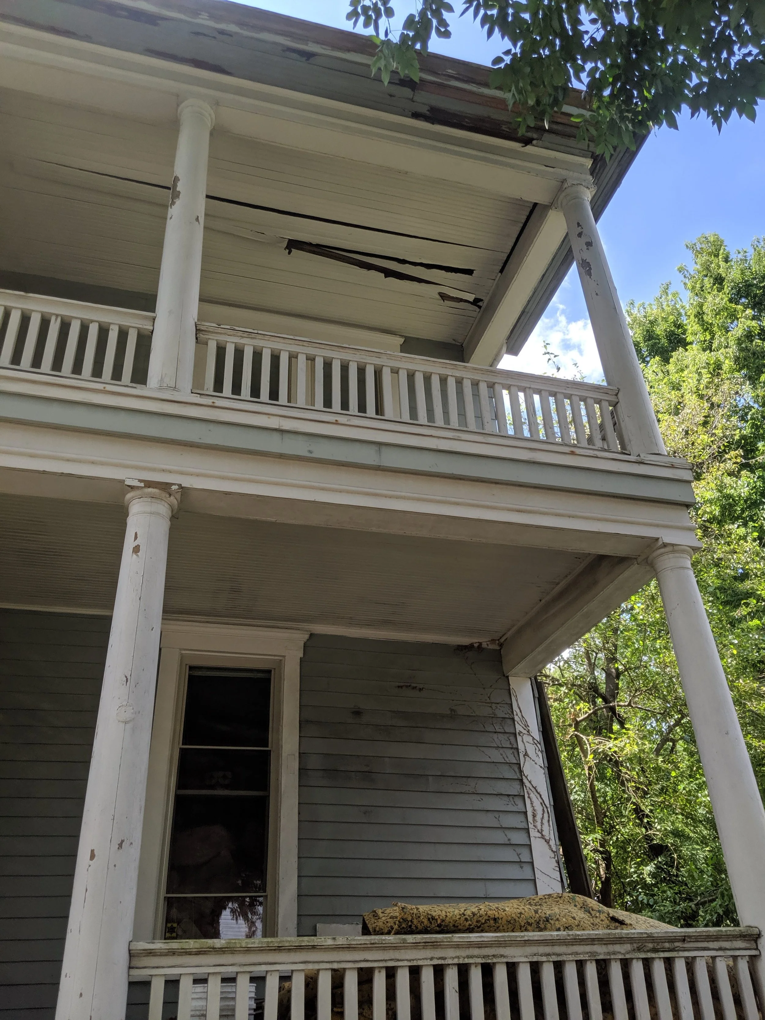 Evanston-multi-family-full-home-restoration-rotten-porch.jpg