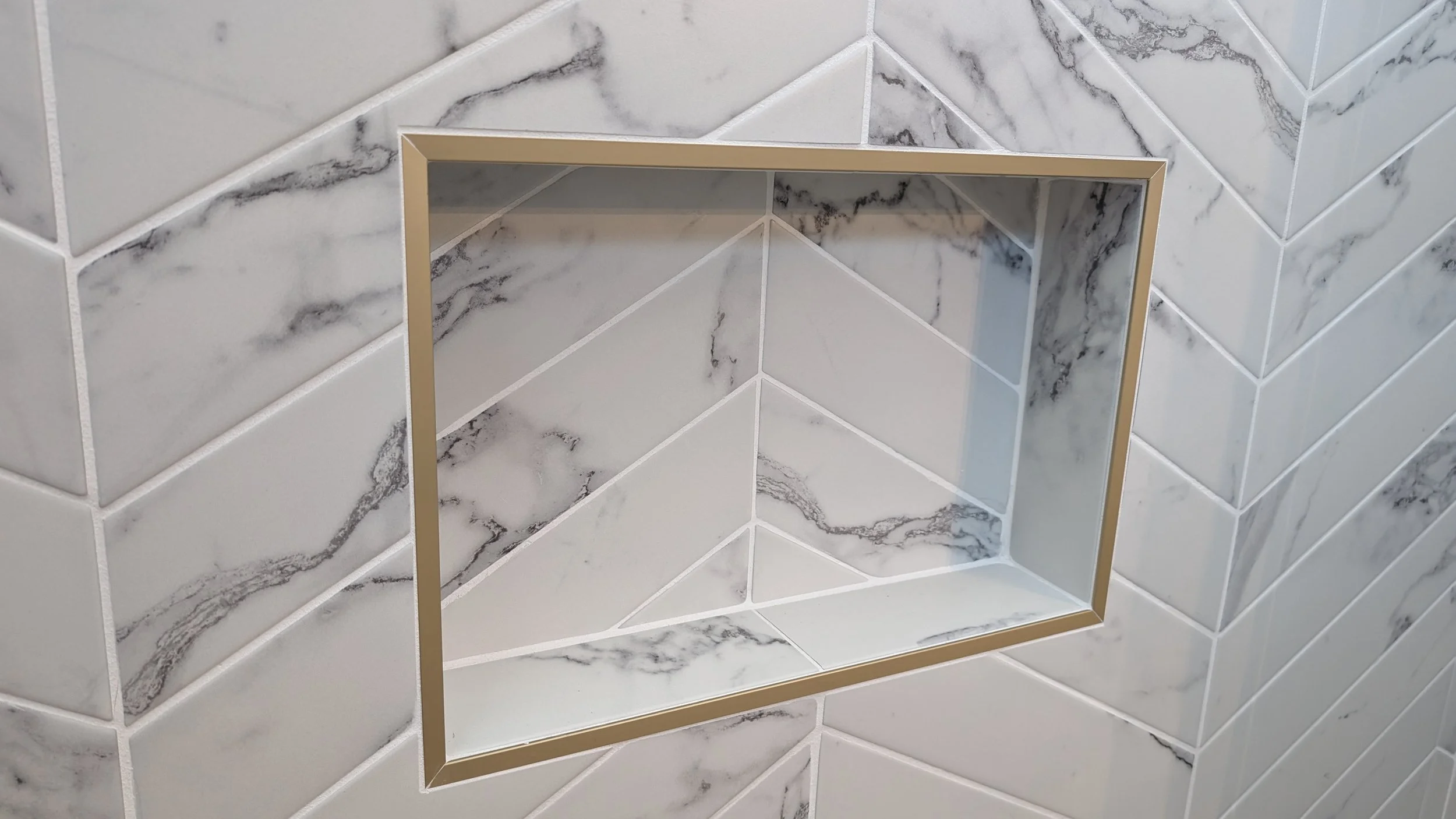 Loveland-bathroom-renovation-chevron-tile-niche.jpg
