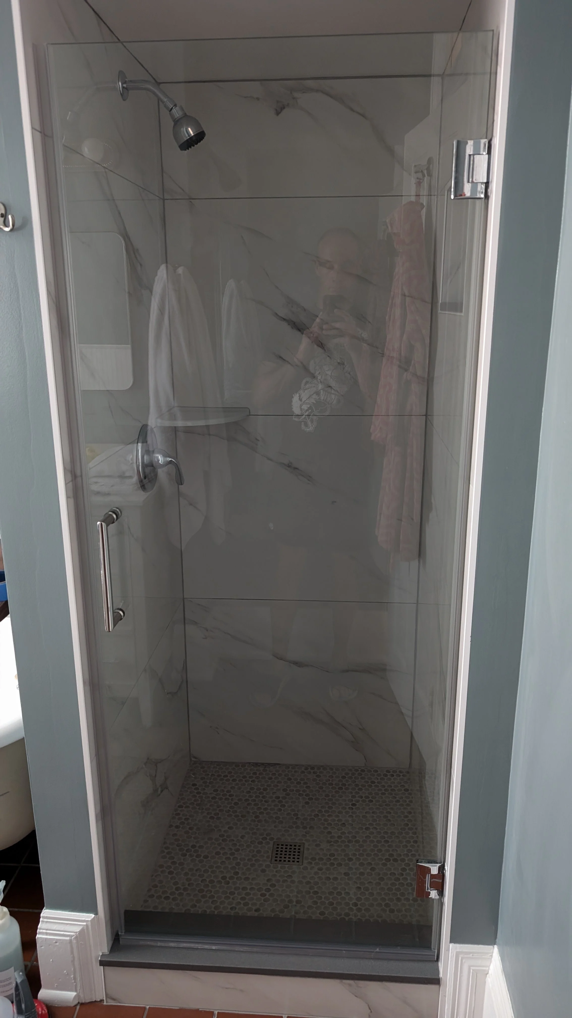 Walnut-hills-small-shower-large-tile-glass-door.jpg