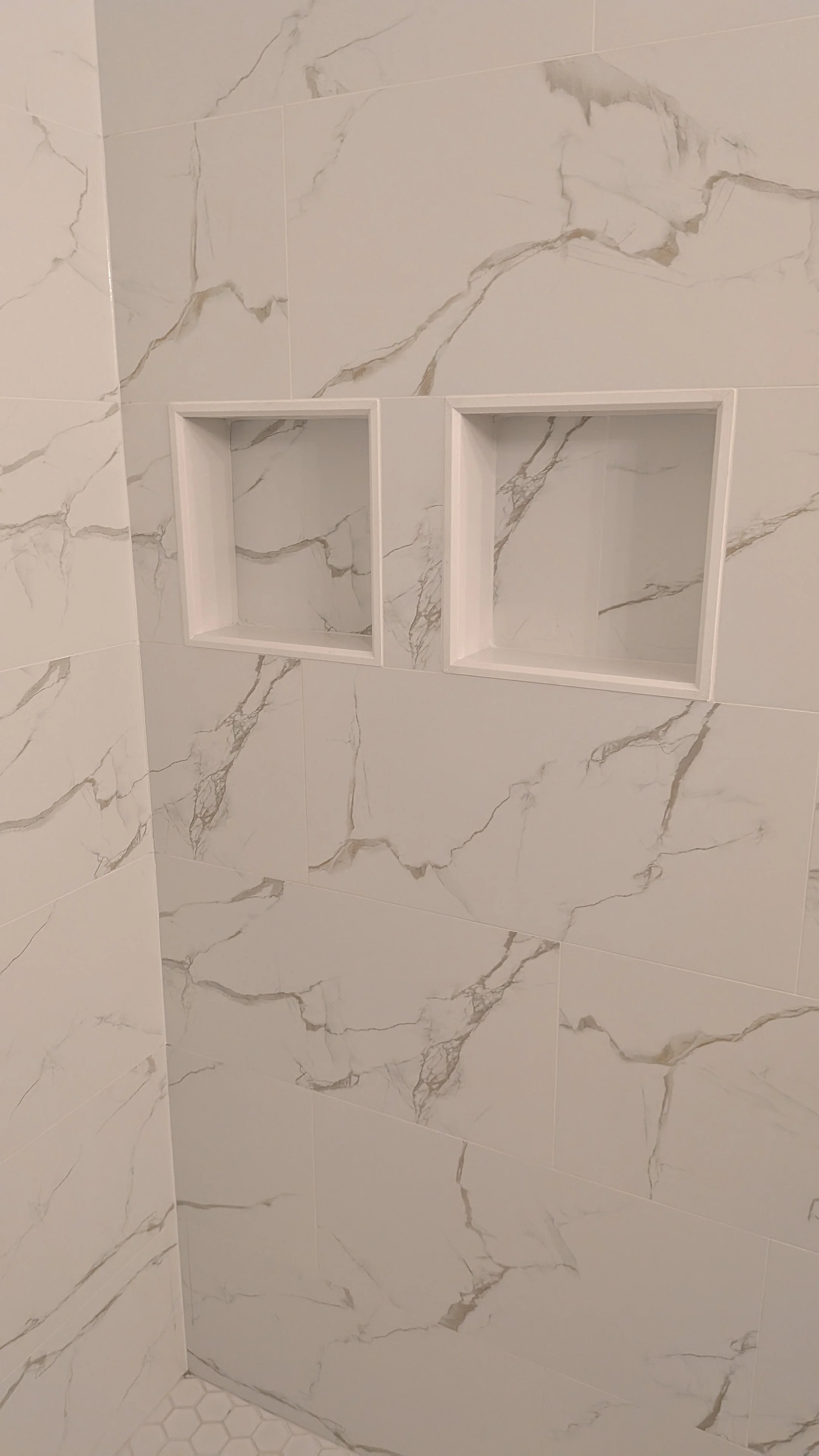 OTR-Cincinnati-OH-condo-master-bathroom-quartz-wrapped-niche.jpg