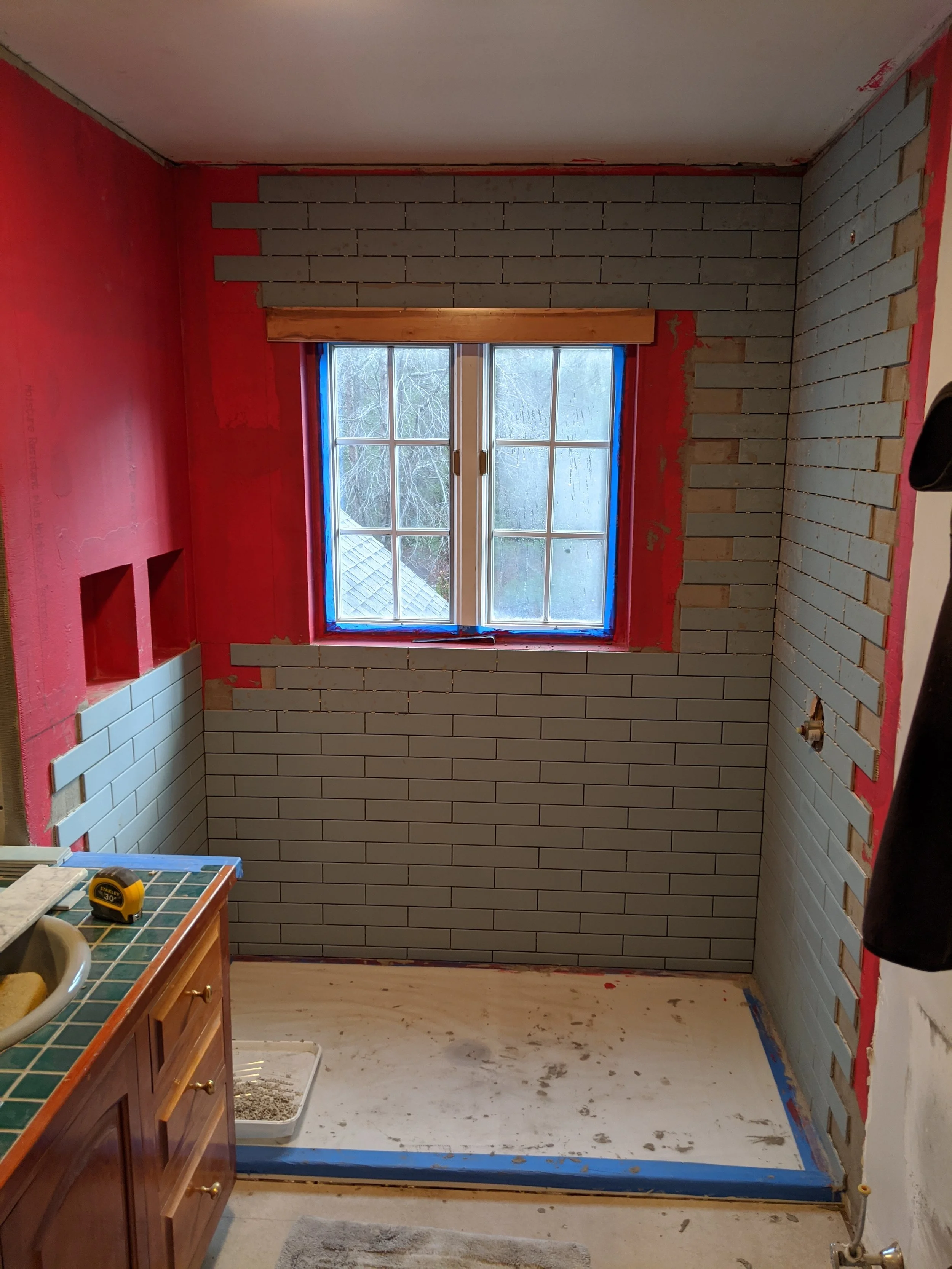 Family-master-bathroom-renovation-blue-subway-tile.jpg
