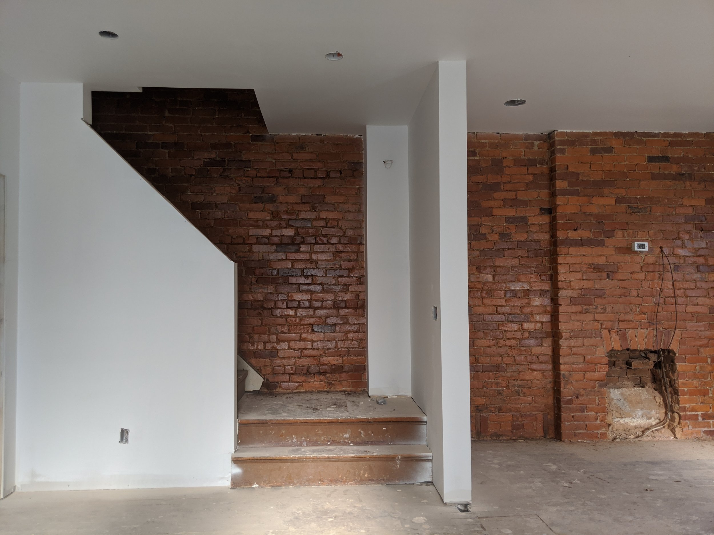 Cincinnati-home-restoration-interior-drywall-original-brick.jpg