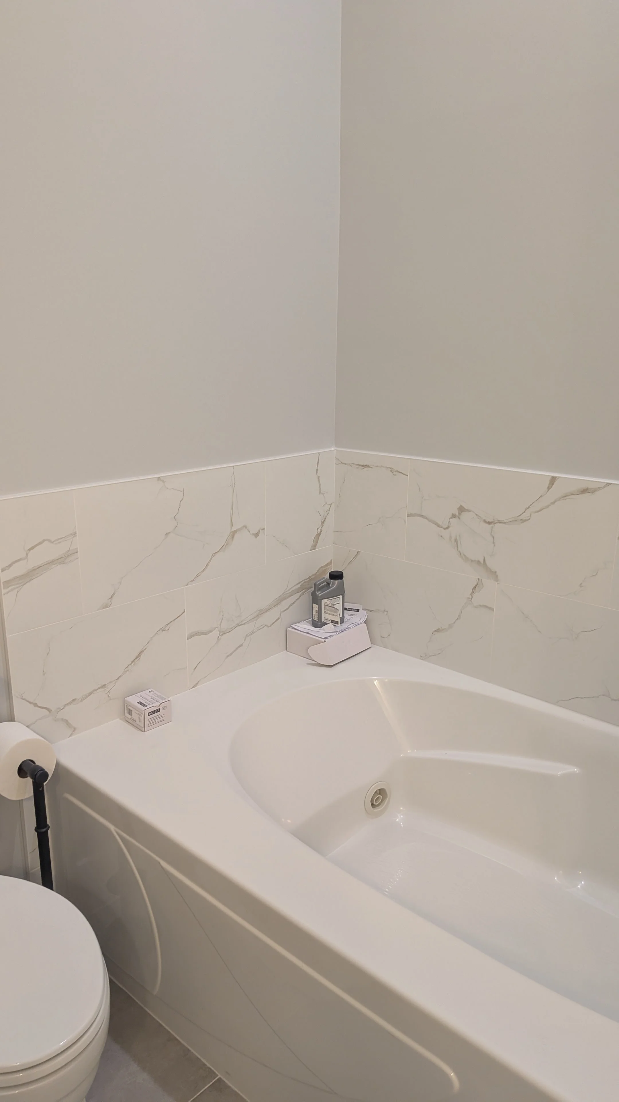 OTR-Cincinnati-OH-condo-master-bathroom-tile-tub-surround.jpg