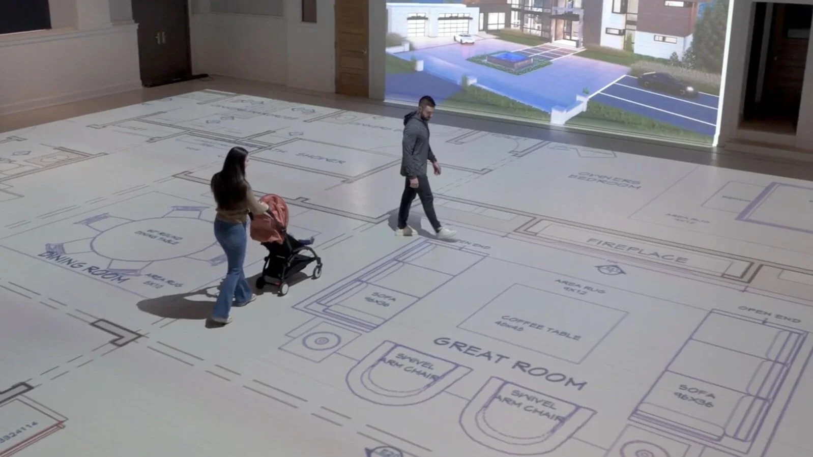 Interior of a room with a projected house floor plan on the floor and a window showing an outdoor landscape with a tennis court and parking lot.