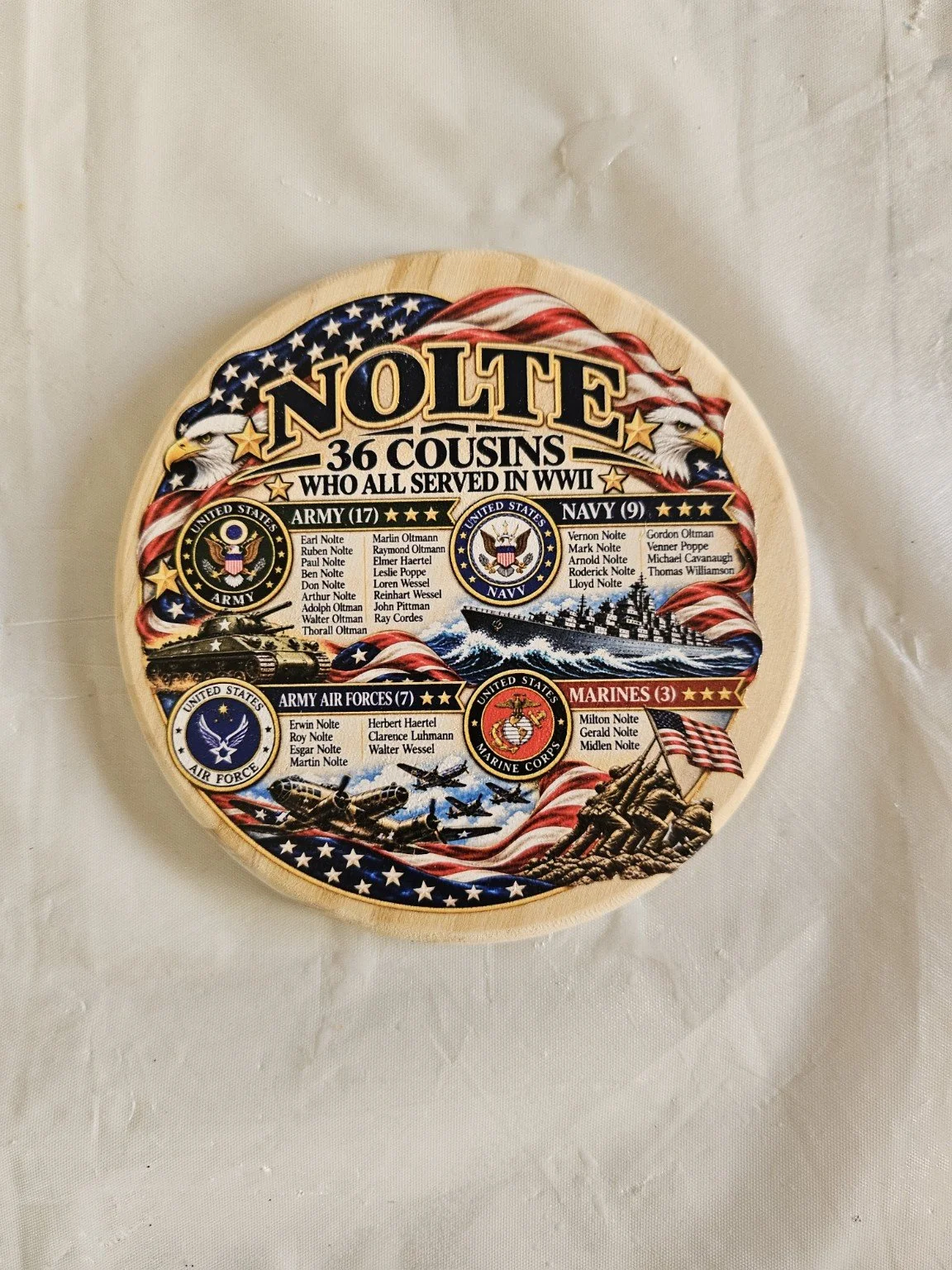 Nolte 36 round wood coaster featuring the family’s military service tribute.