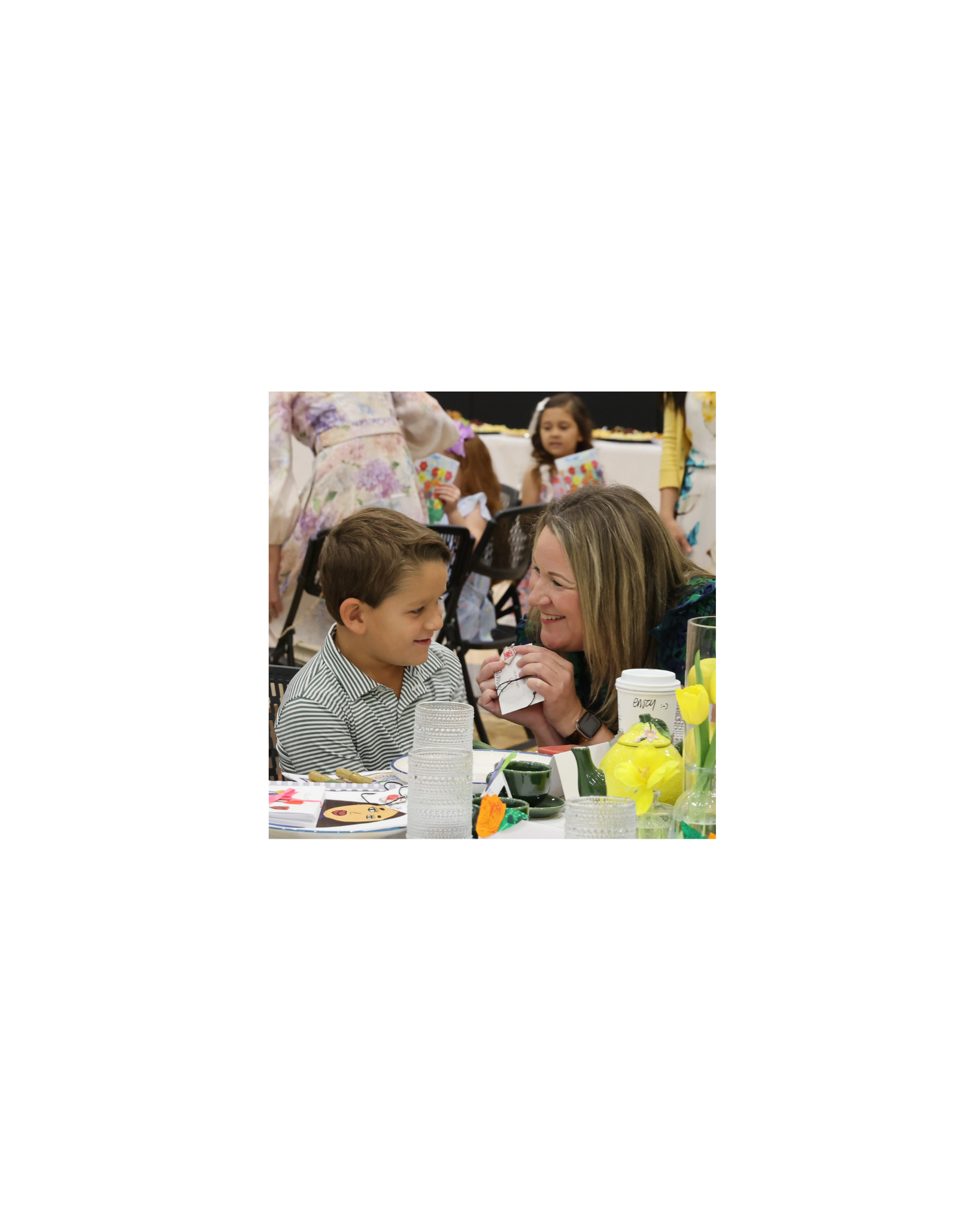Mother smiles at Kindergarten child