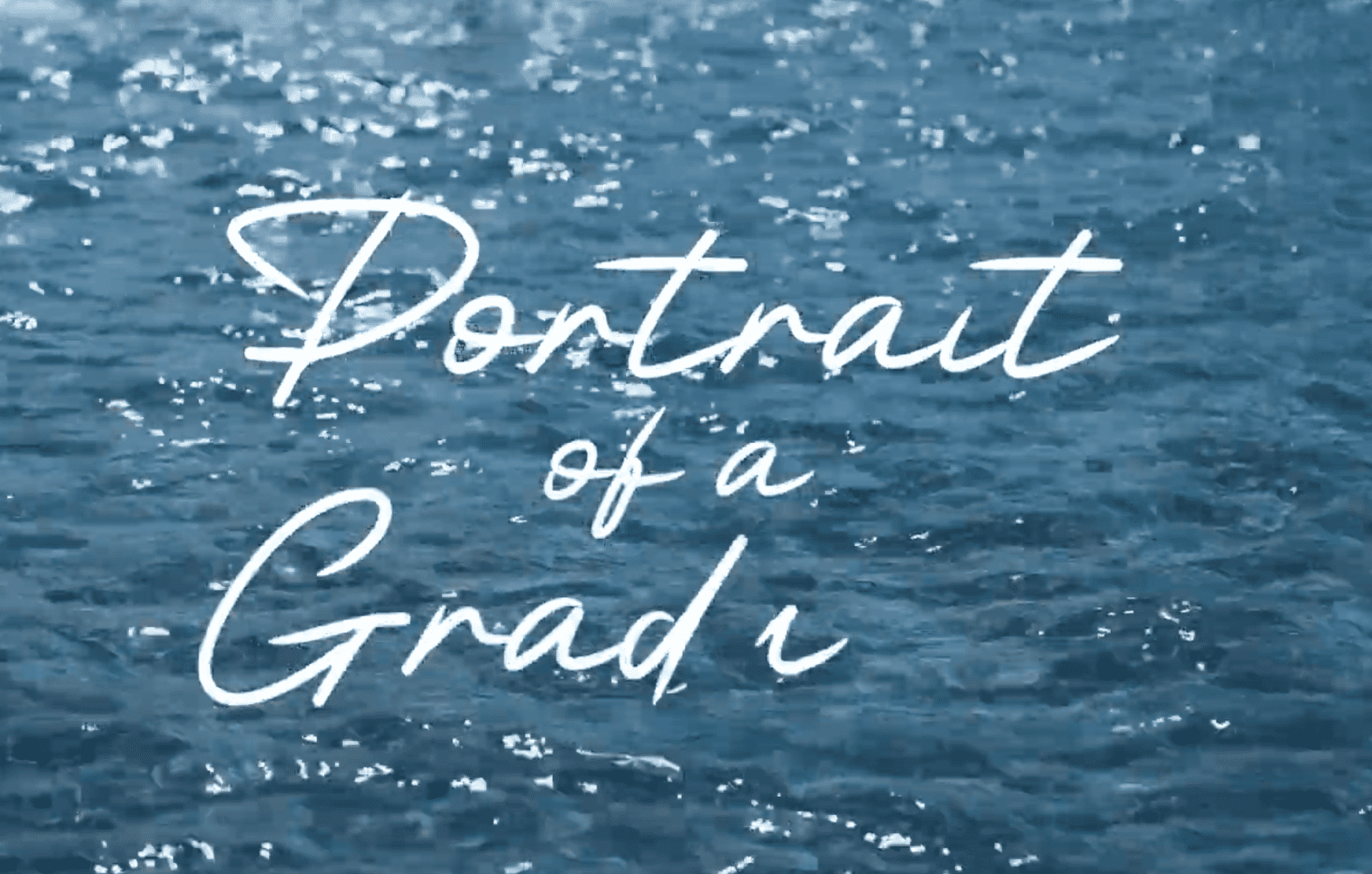 Text overlay on water background reading 'Portrait of a Grand'