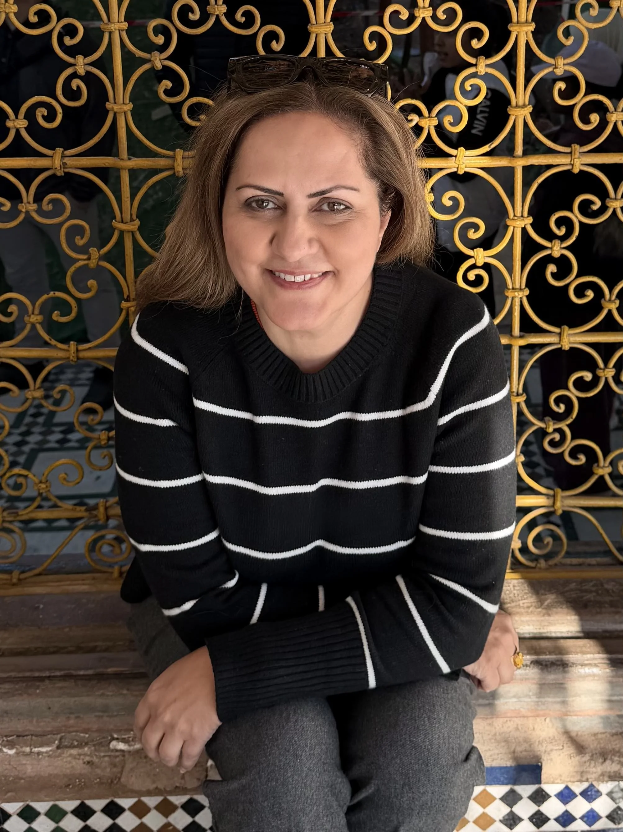 Sue Asghari, founder and travel curator of Morocco Bahja Tours, at Bahia Palace in Marrakech