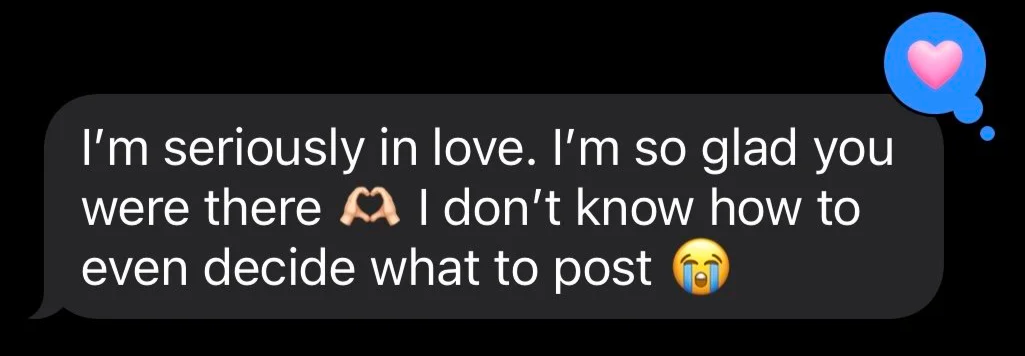 A text message bubble with a heart icon and a speech bubble containing a romantic message.