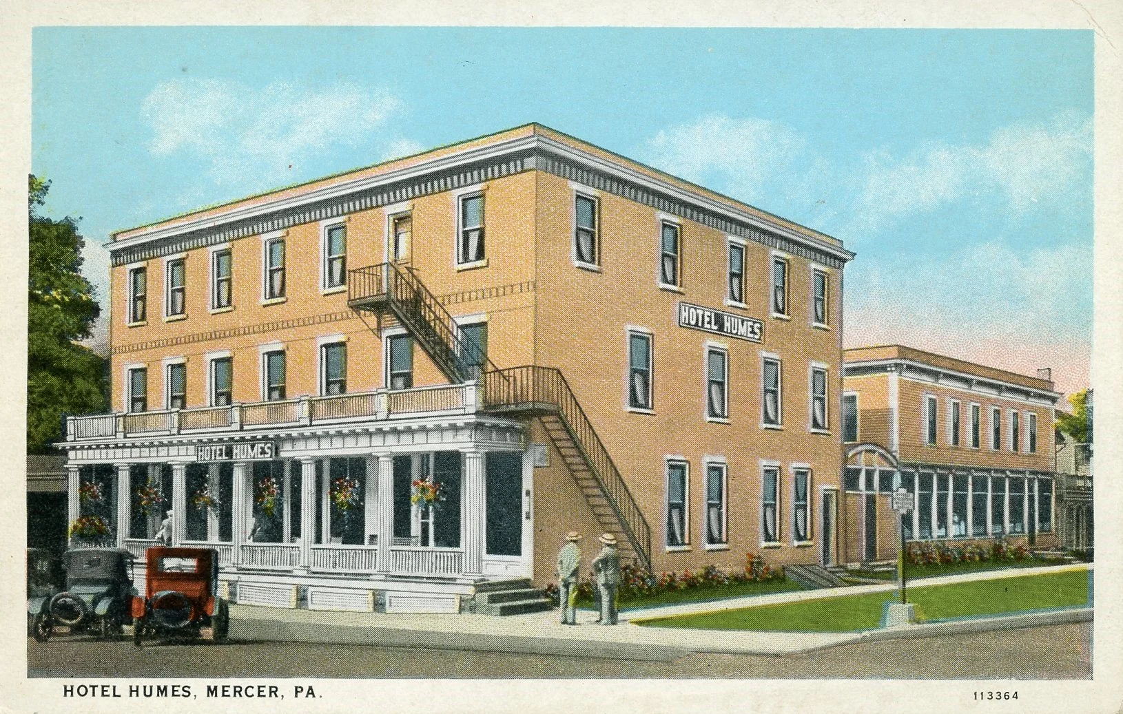A vintage illustration of Hotel Humes in Mercer, Pennsylvania, showing a three-story brick building with a white porch, an external staircase, and a sign on the side of the building that says 'Hotel Humes.' Two people are standing outside near the si