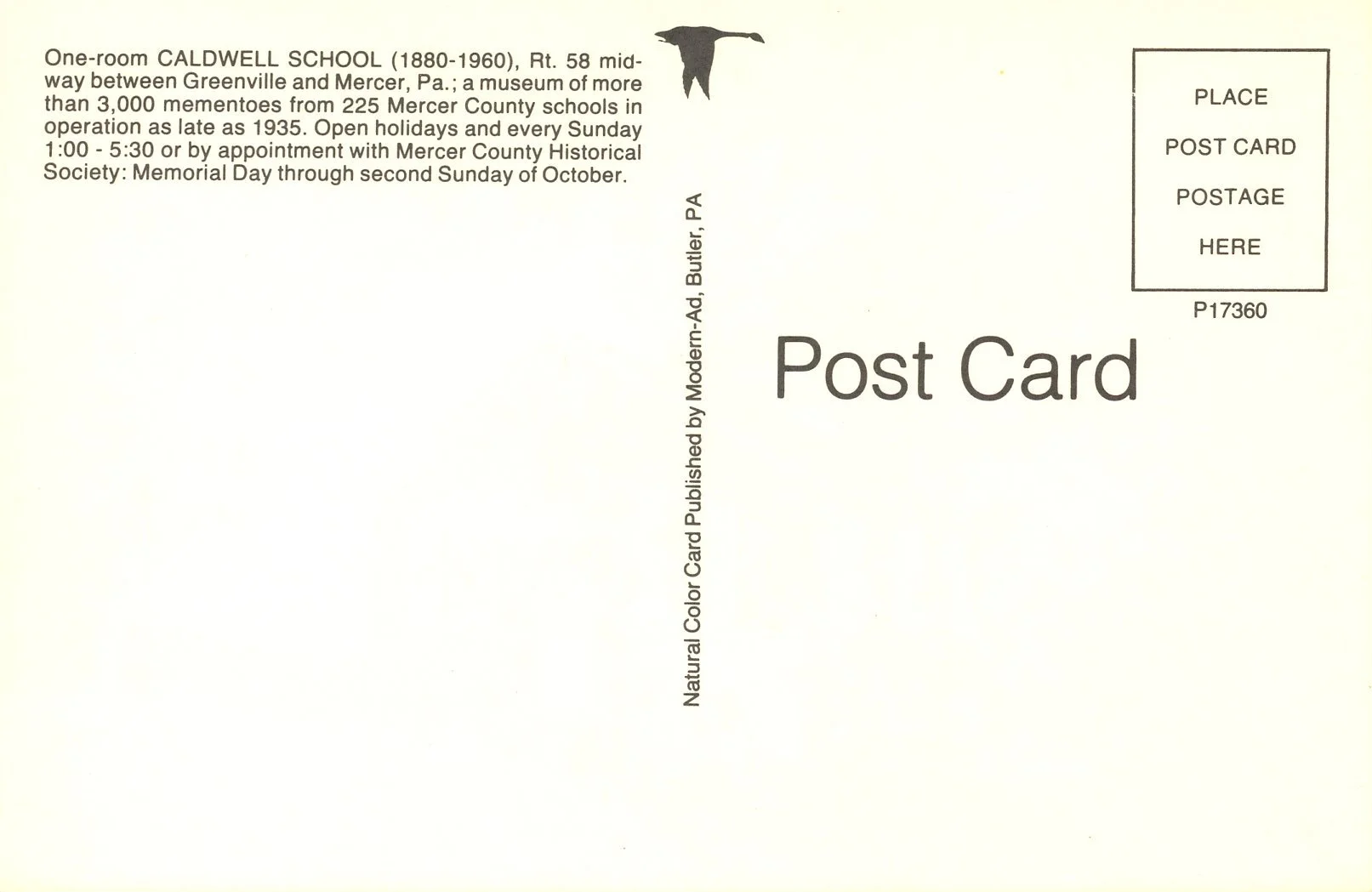 Back of a vintage postcard featuring a description of Caldwell School, a small one-room schoolhouse that operated from 1880 to 1960 in Butler, Pennsylvania. The postcard includes a small image of a bird at the top and a postage box in the upper right