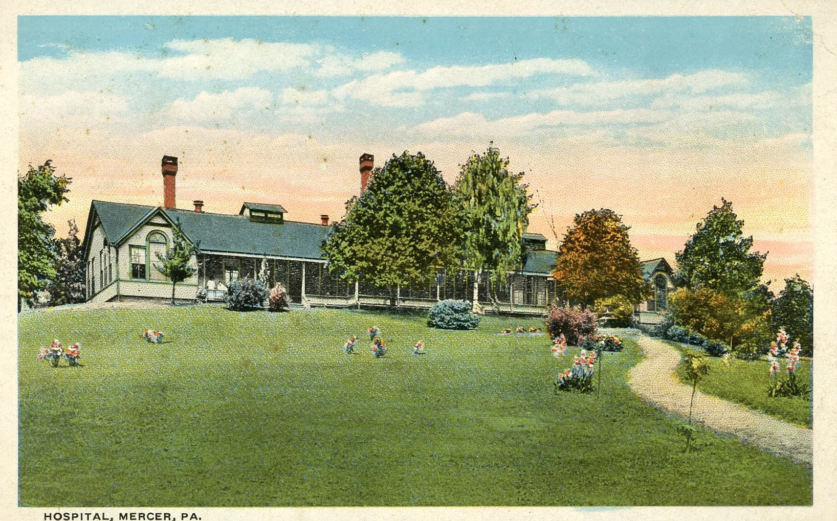 A vintage illustration of Mercer Hospital in Pennsylvania, showing a large, historic building with multiple chimneys, surrounded by trees, a well-maintained lawn with flower beds and a winding pathway, during sunset with a partly cloudy sky.
