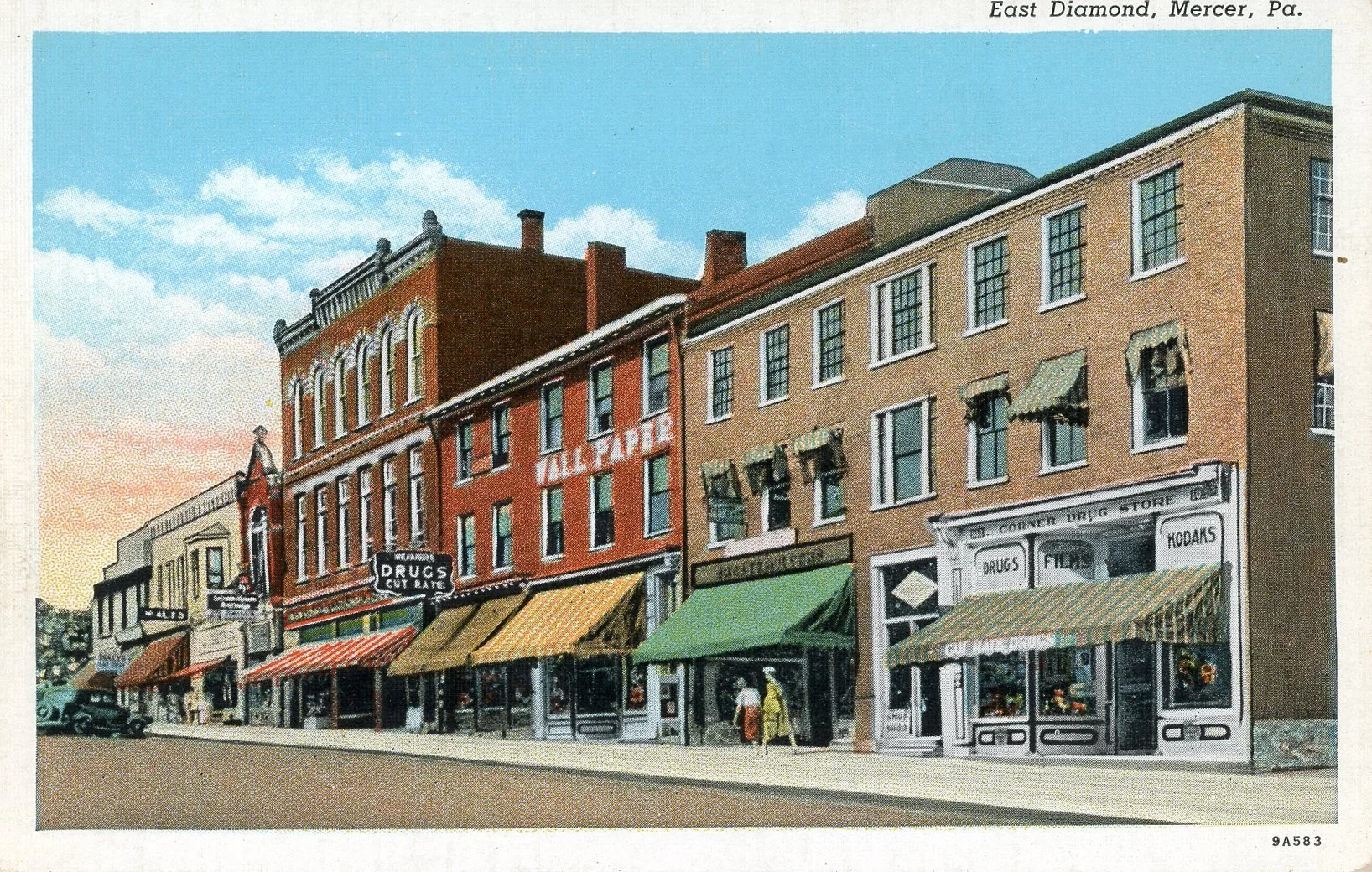 Colorful illustration of a historic Main Street with brick buildings, storefronts with striped awnings, and people walking along the sidewalk under a blue sky with clouds.