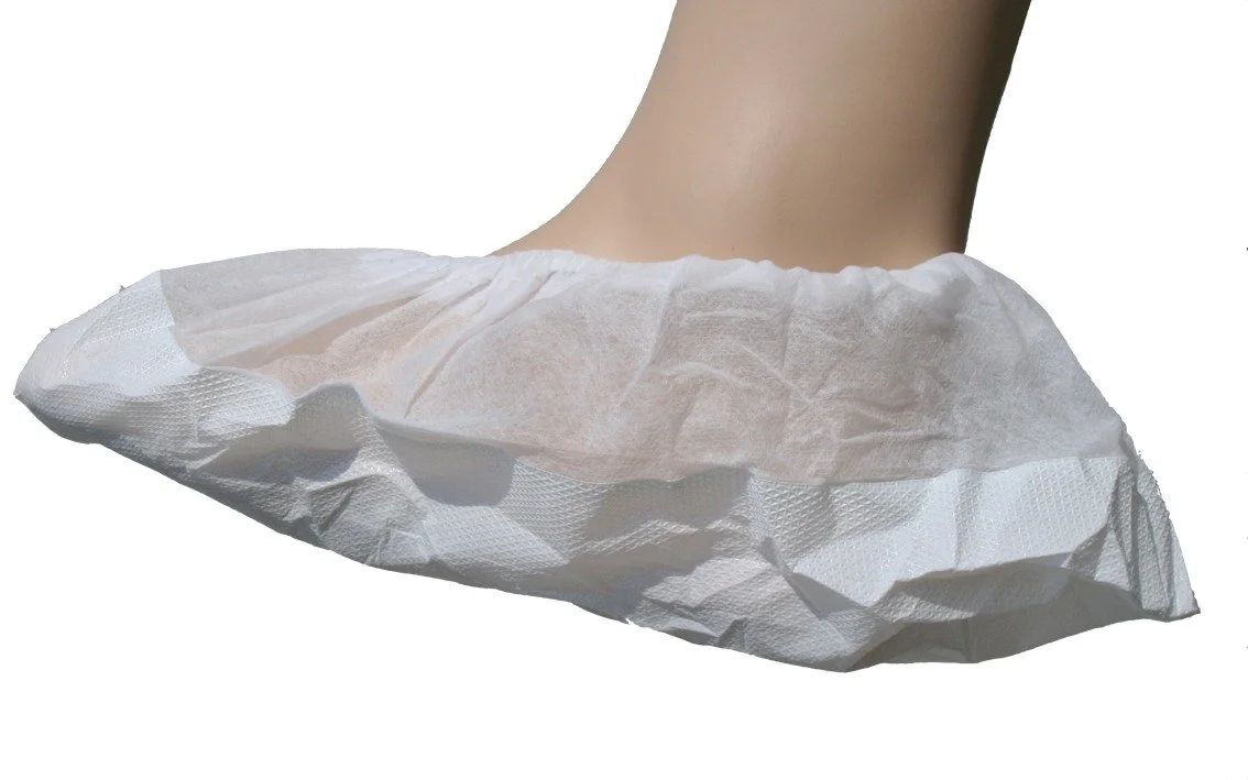 Close-up of a white disposable surgical mask.