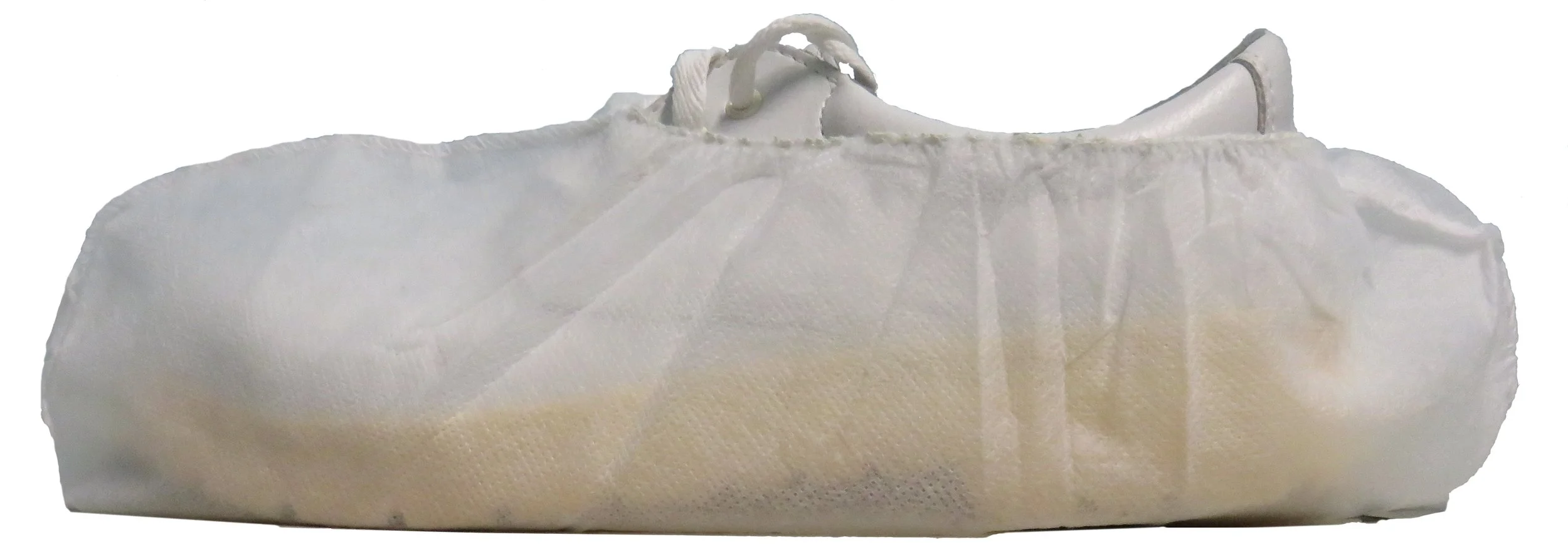 Close-up of a white disposable surgical mask.