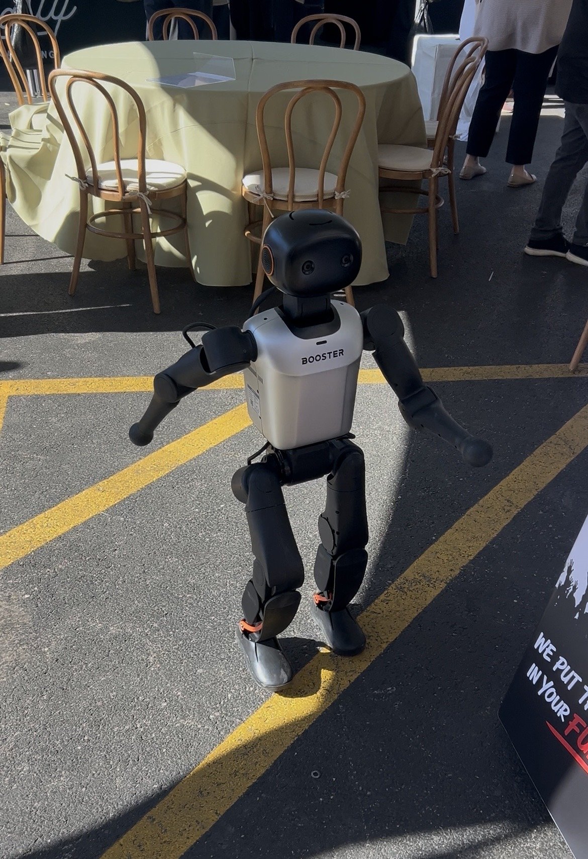 Kai, a humanoid robot dancing for attendees at a private party.