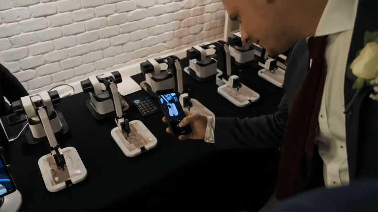 Businessmen Love watching Draw Me Bot Sketch