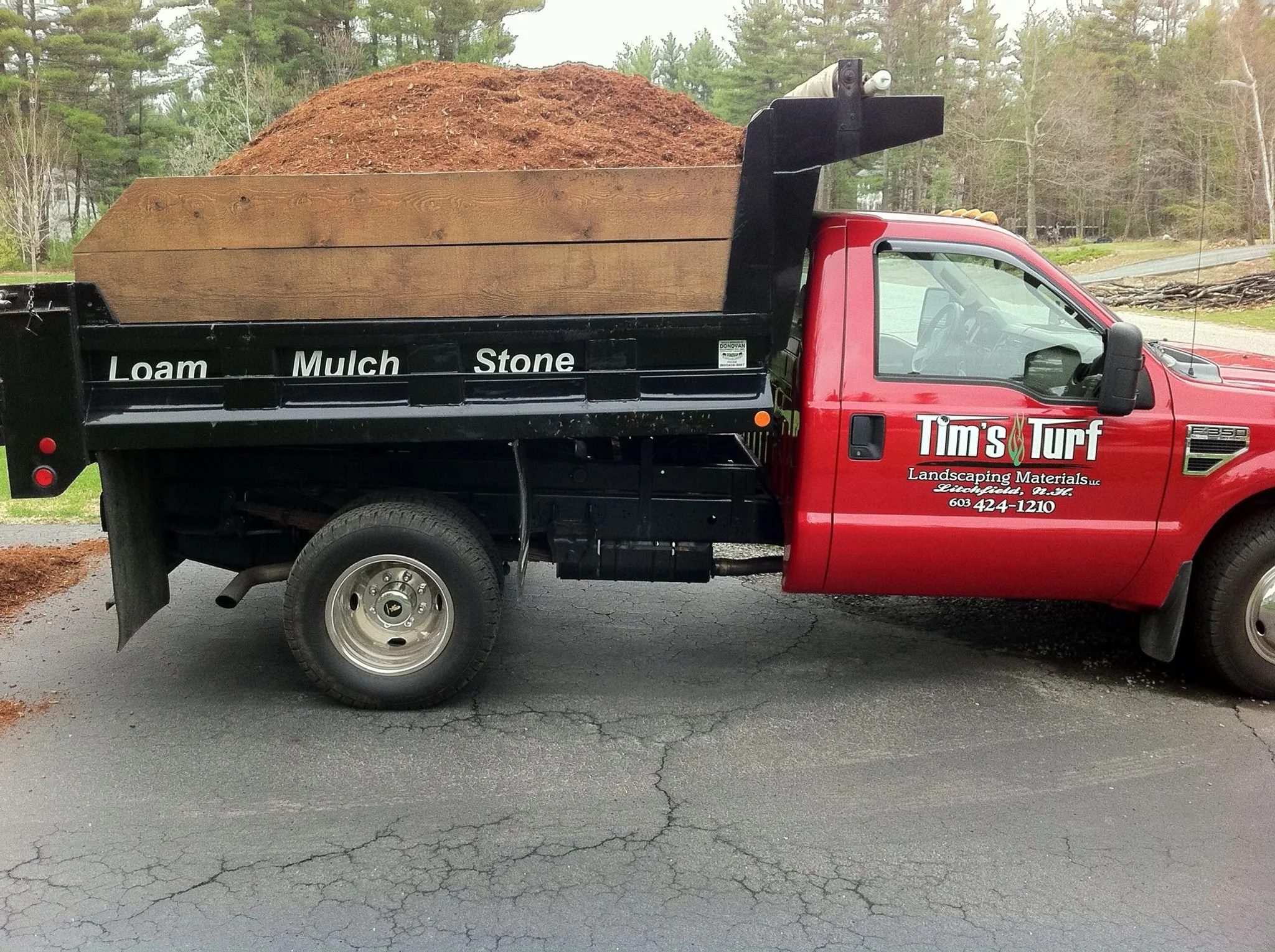 Tim's Turf and Landscaping Materials bark mulch delivery truck 
